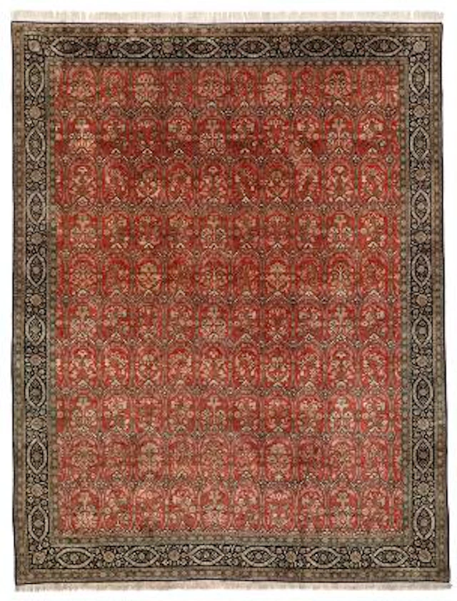 A Qum full silk carpet, Persia. Repeating floral design on a soft
