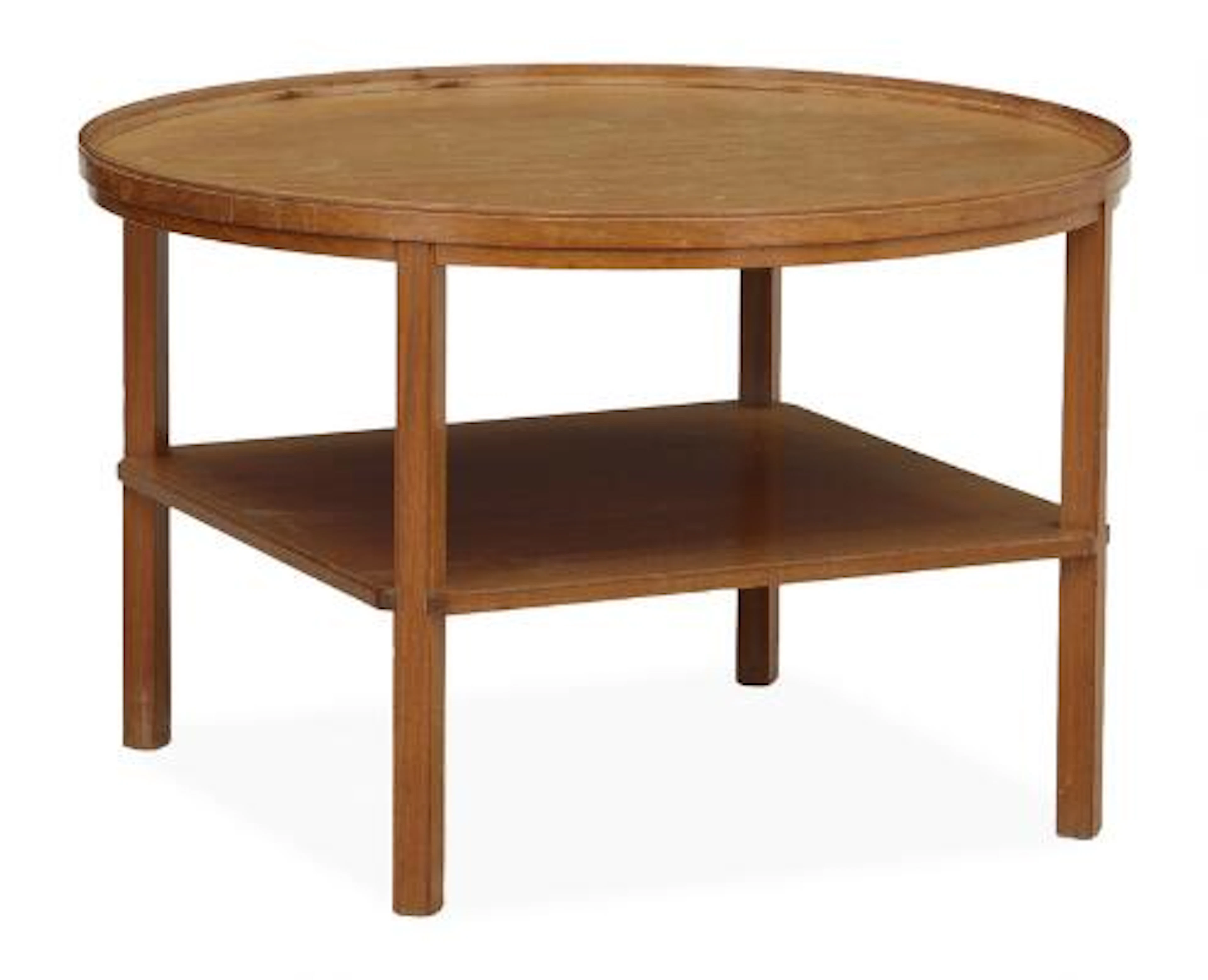 Kaare Klint: "Rygebord". Circular coffee table in mahogany with moulded