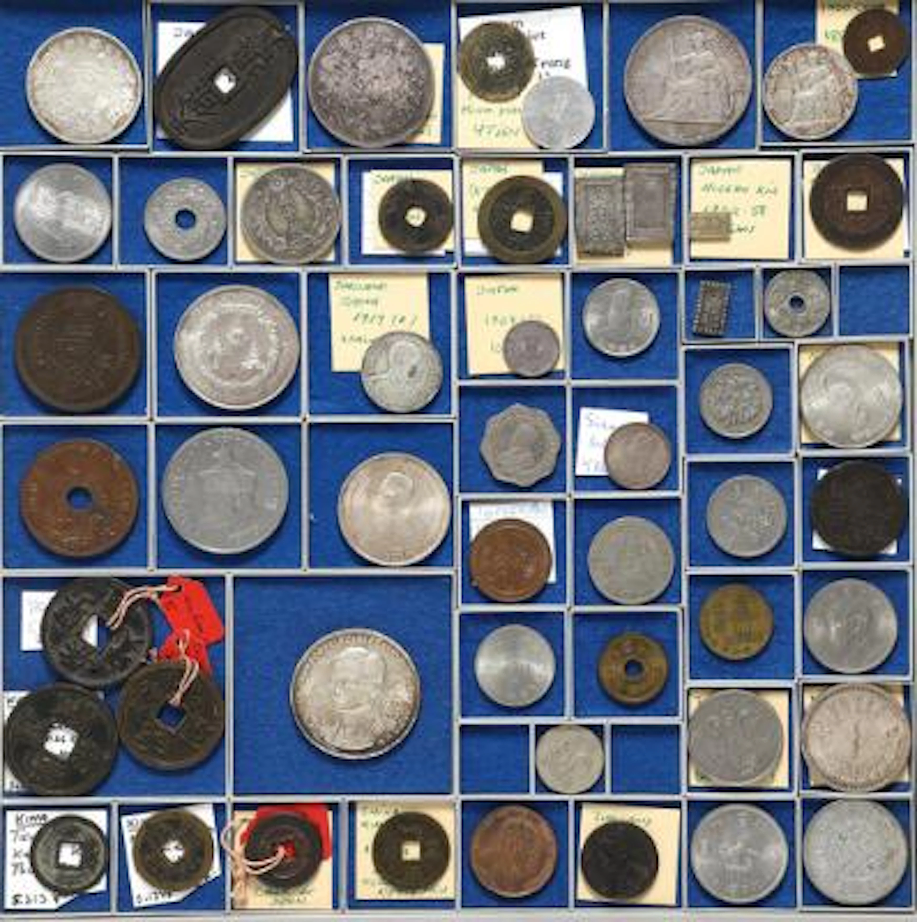 Collection of coins from China, Japan, Thailand, Nepal, Tibet, Vietnam