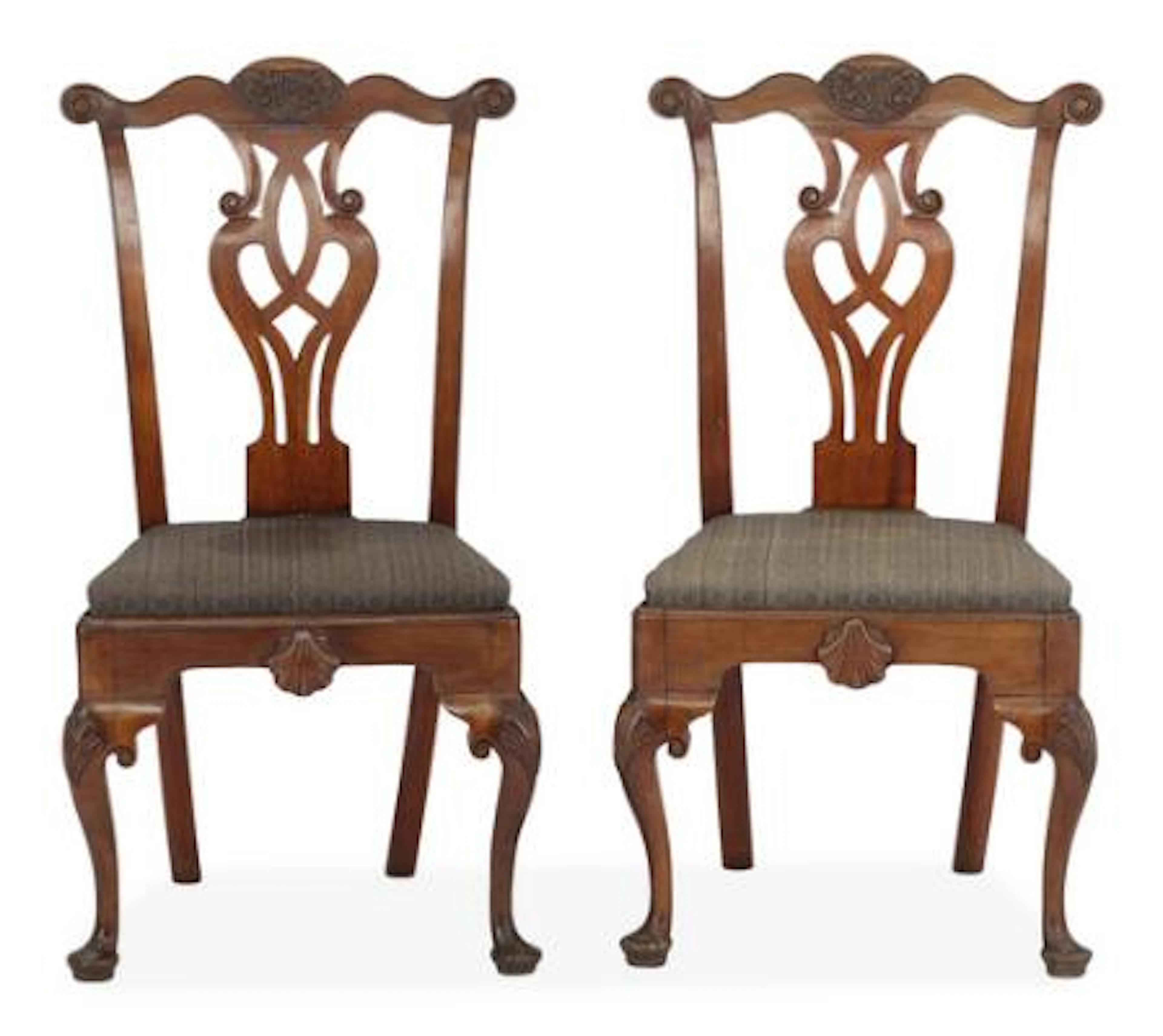 A pair of American mahogany side chairs in the style of Thomas Chippendale
