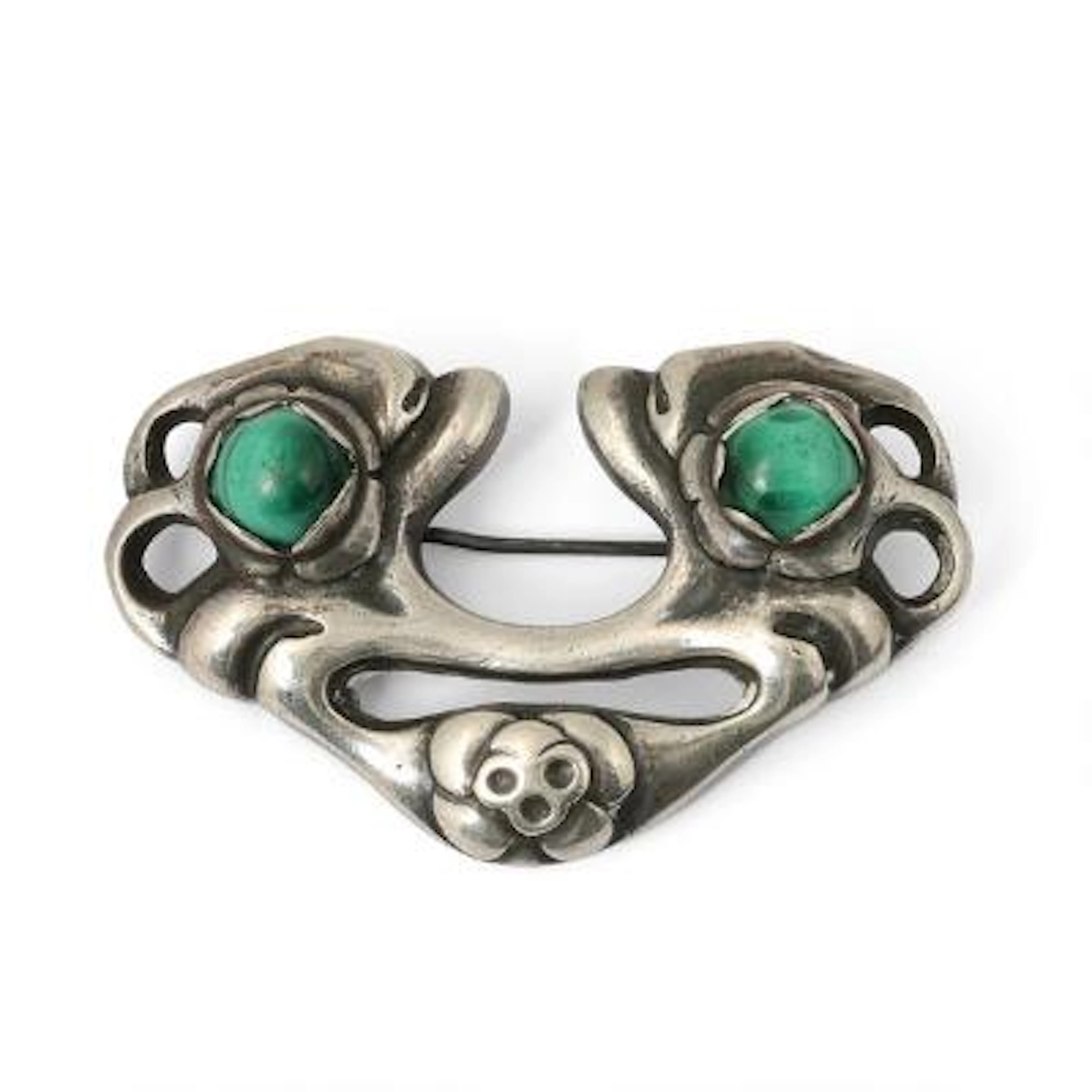 Mogens Ballin: A malachite brooch set with two cabochon malachite