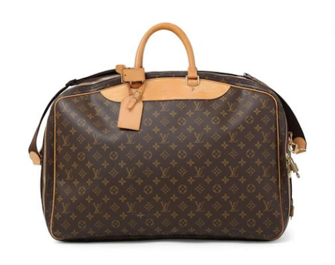 Louis Vuitton: An "Alizé" travel bag in brown monogram coated canvas