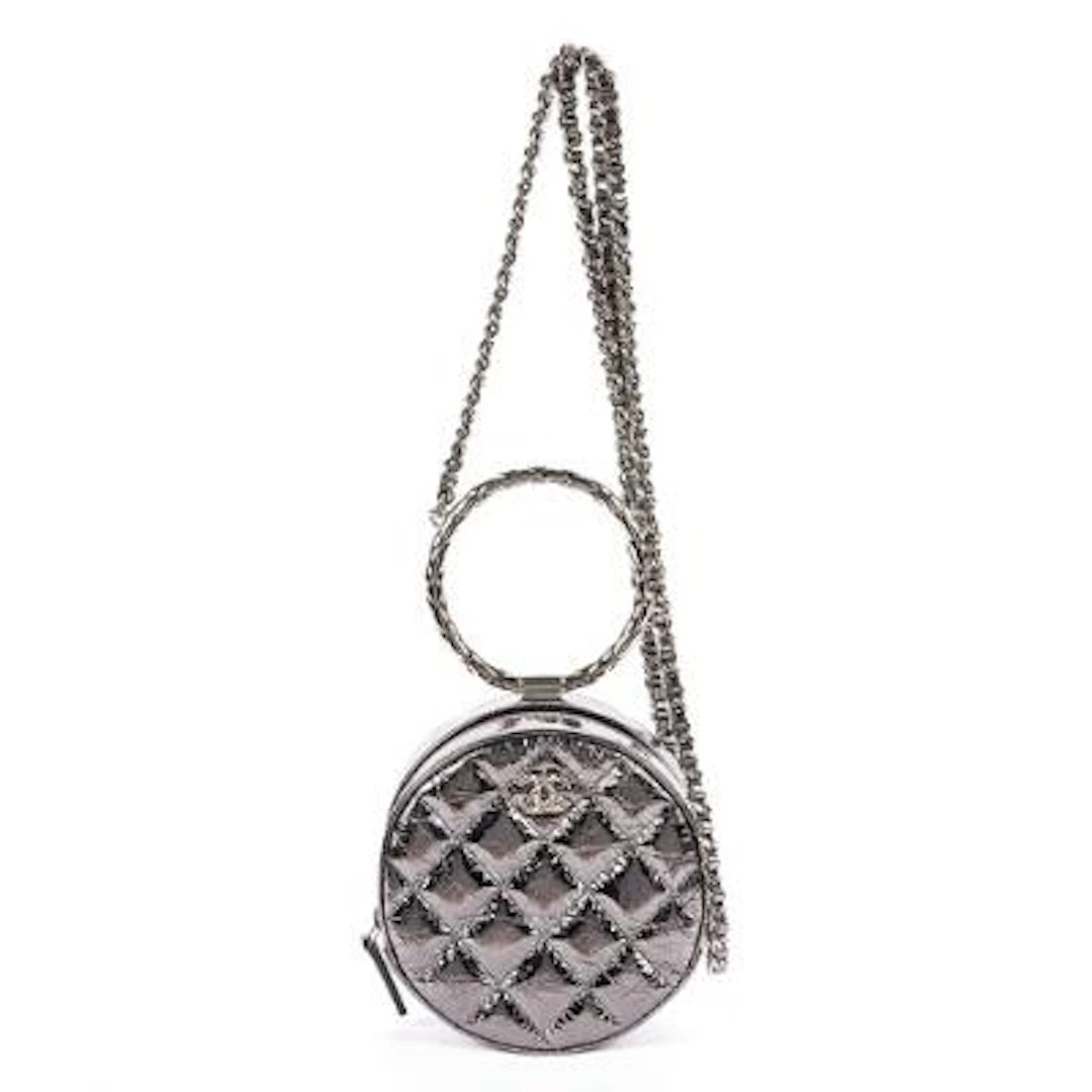 Chanel: "Round Bracelet Crossbody" handbag of metallic quilted leather