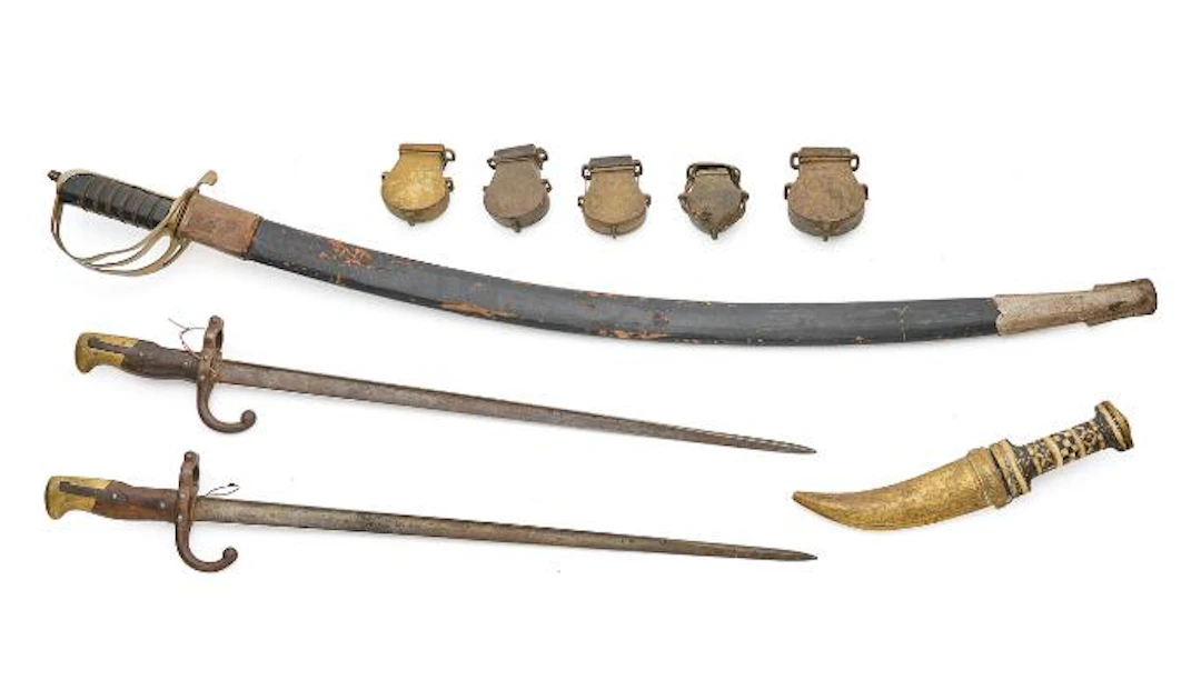 Two bayonets, five bullet containers, as well as a Syrus dagger and