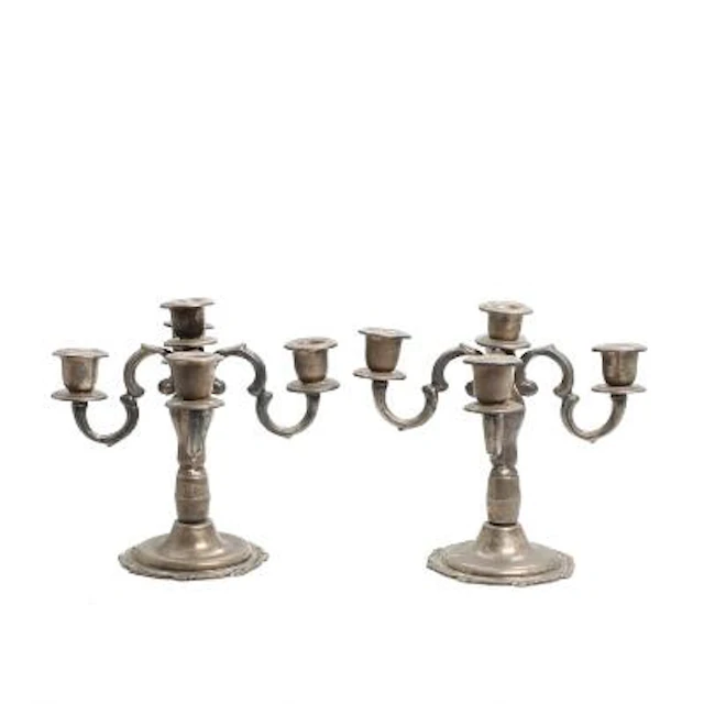 A pair of Peruvian five-light candelabras of sterling silver. H. 27