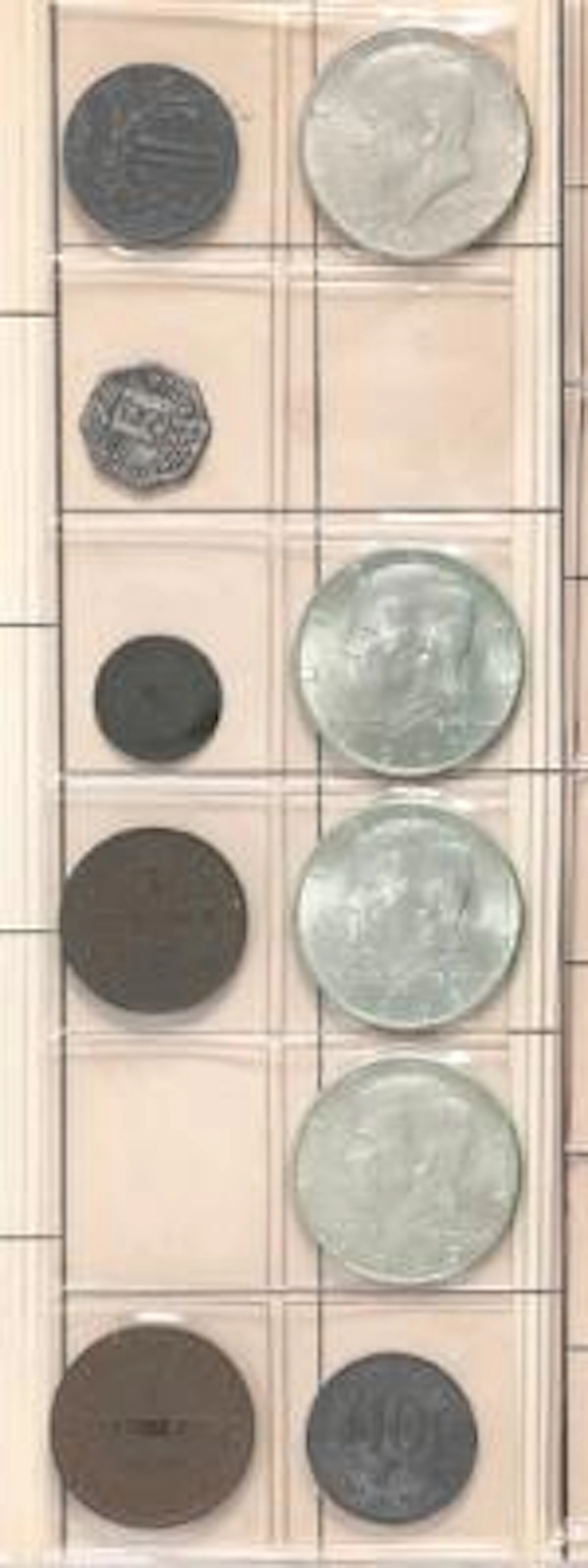 2 albums with coins from Denmark, England, Finland, Holland, Iceland