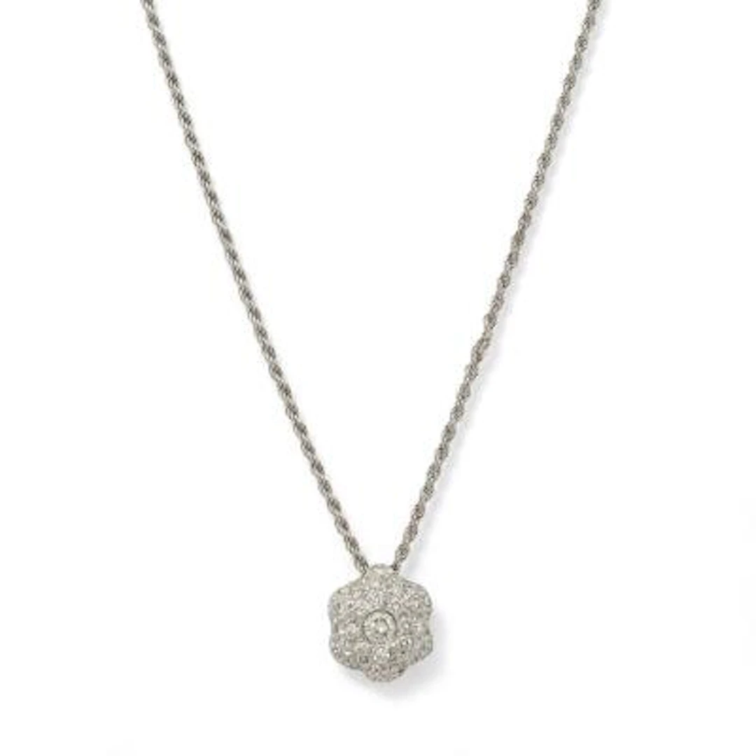 A necklace set with a diamond pendant, mounted in 18k white gold.