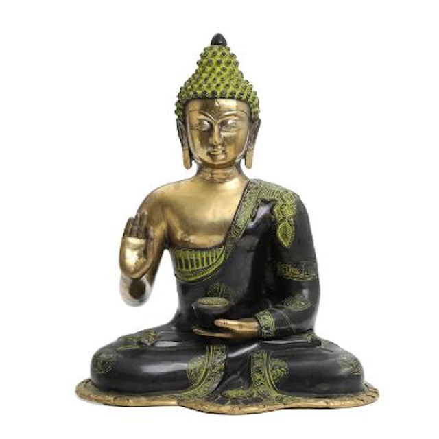 Buddha of partially green and dark patinated bronze. Sealed. Tibet.
