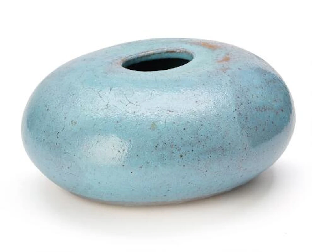 Christian Poulsen: An oval stoneware vase decorated with blue glaze.
