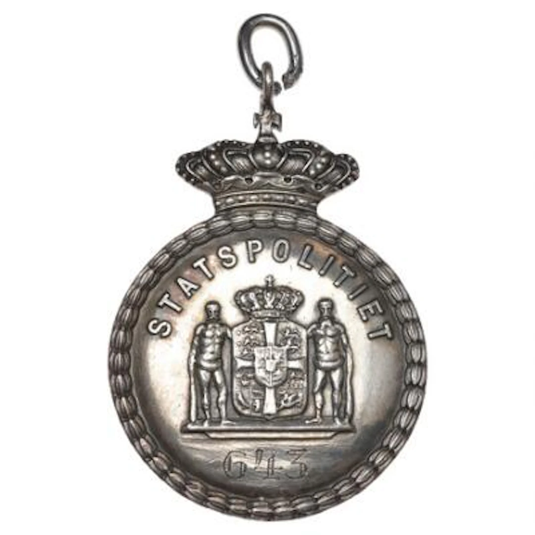 Police badge, State Police, The State Police marked 643, bright metal