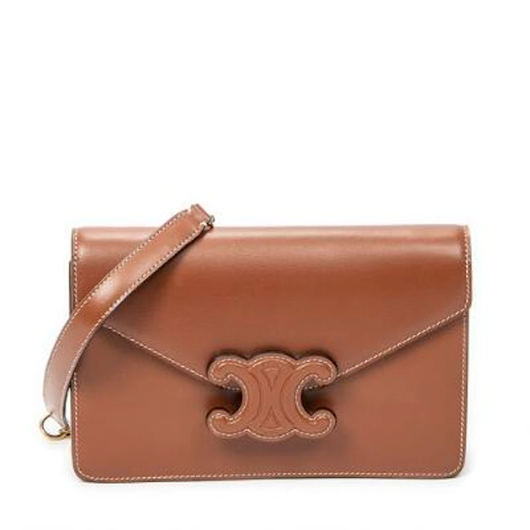 Celine: A "Margo Triomphe Wallet on Chain" in brown leather with gold-tone