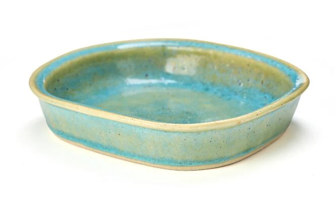 Christian Poulsen: A stoneware dish modelled in a slightly oval shape.