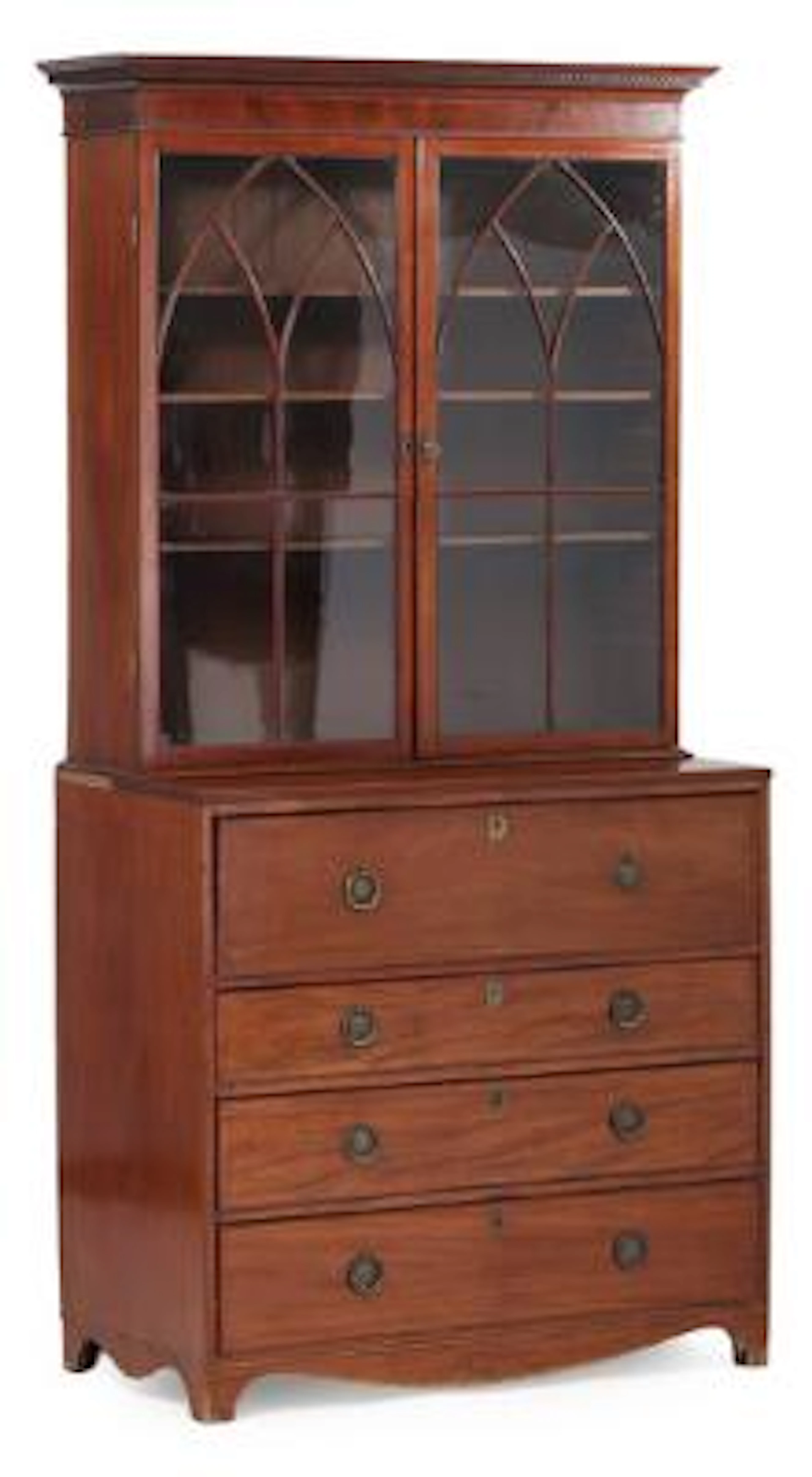 A George III bookcase with writing desk. England, late 18th century.