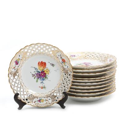 "Saxon Flower". A set of 11 porcelain fruit plates with wide, pierced