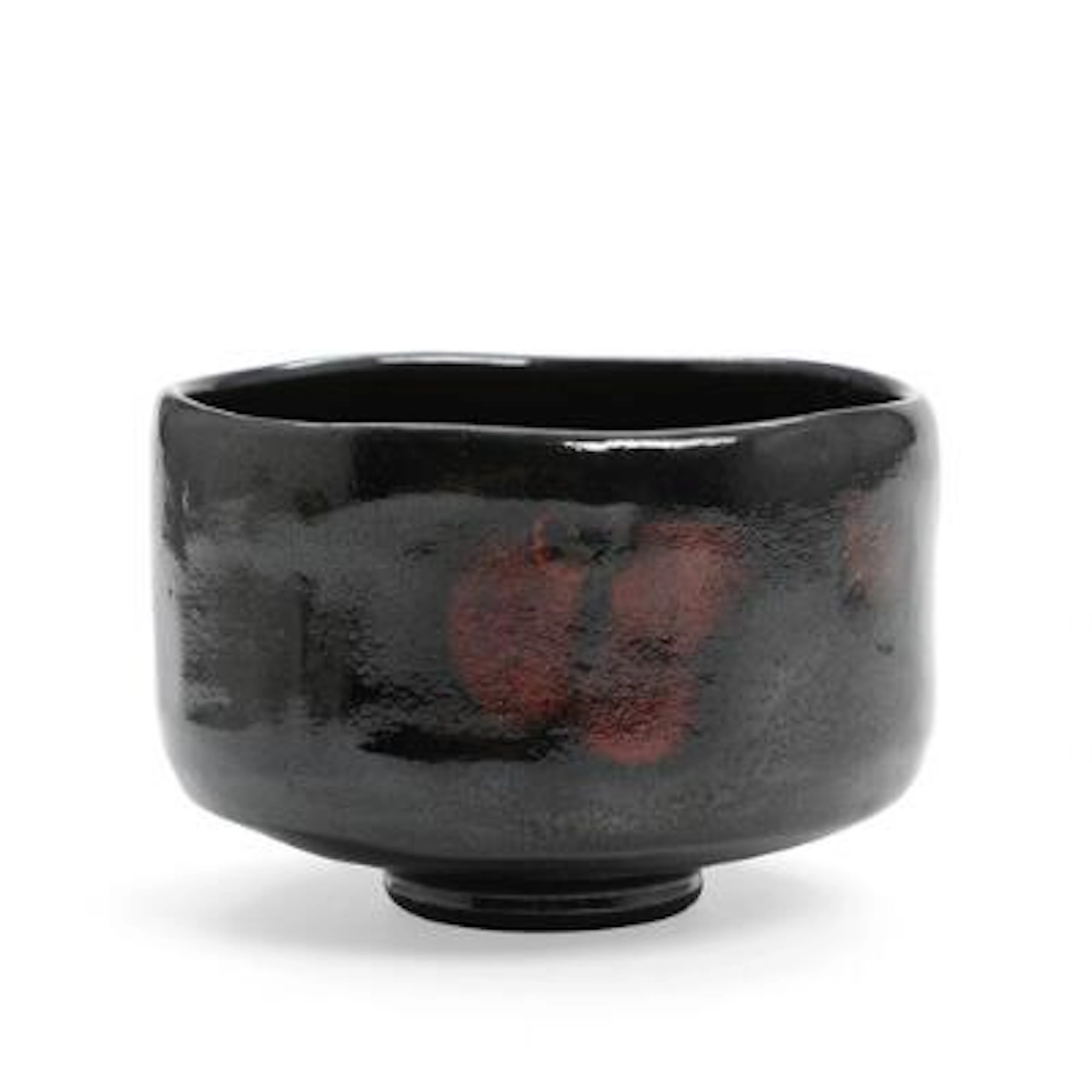 Japanese design: Raku-fired stoneware teacup. Decorated with black