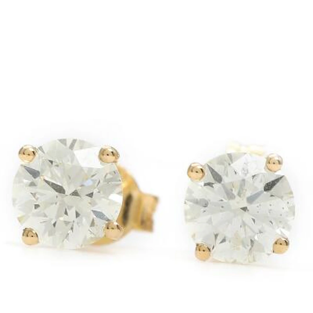 A pair of diamond ear studs, each set with a brilliant-cut diamond