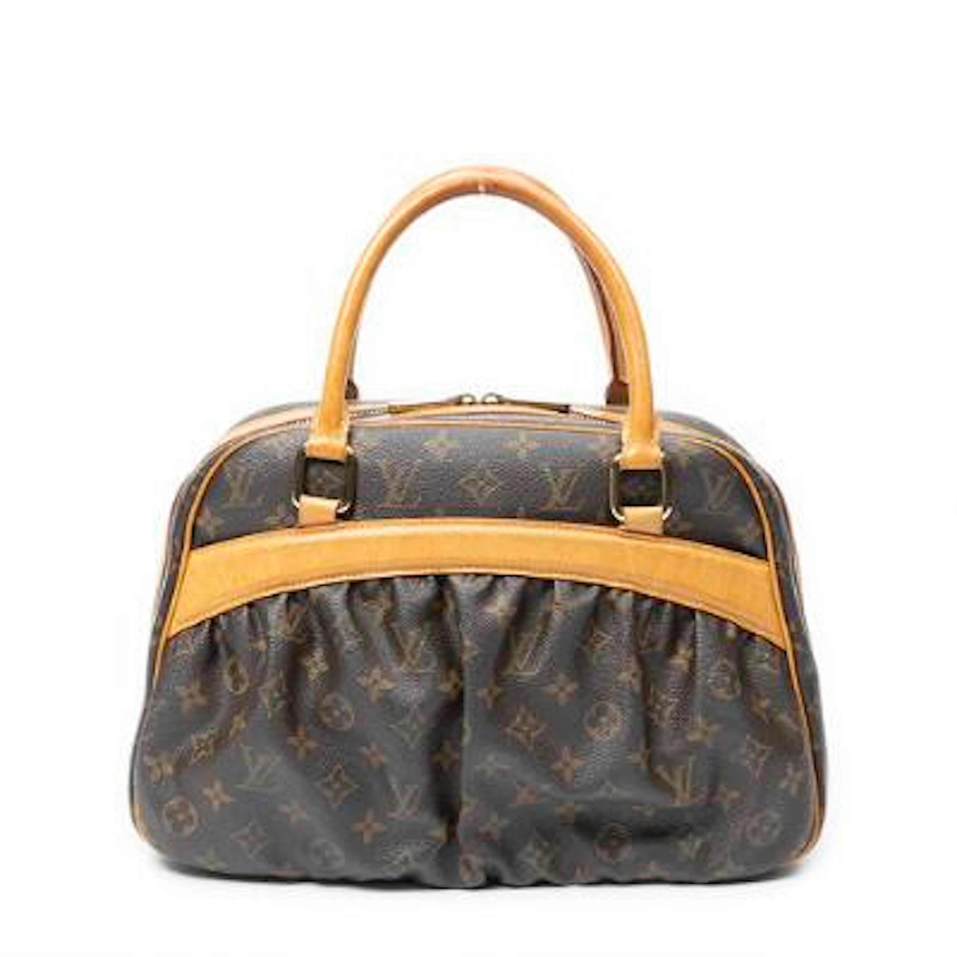 Louis Vuitton: A "Mitzi" of brown monogram coated canvas with brown