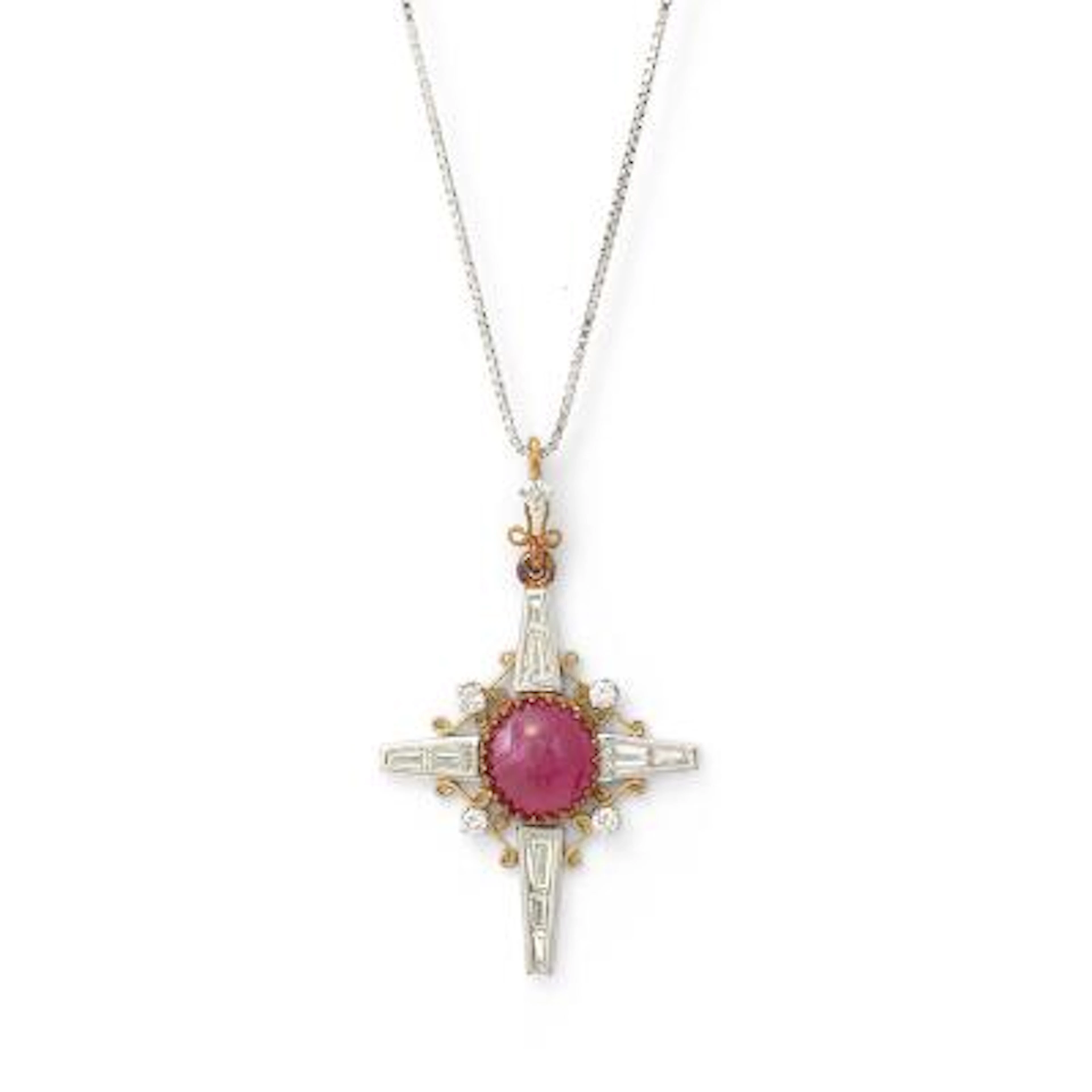 A ruby and diamond necklace set with a ruby and diamonds, mounted