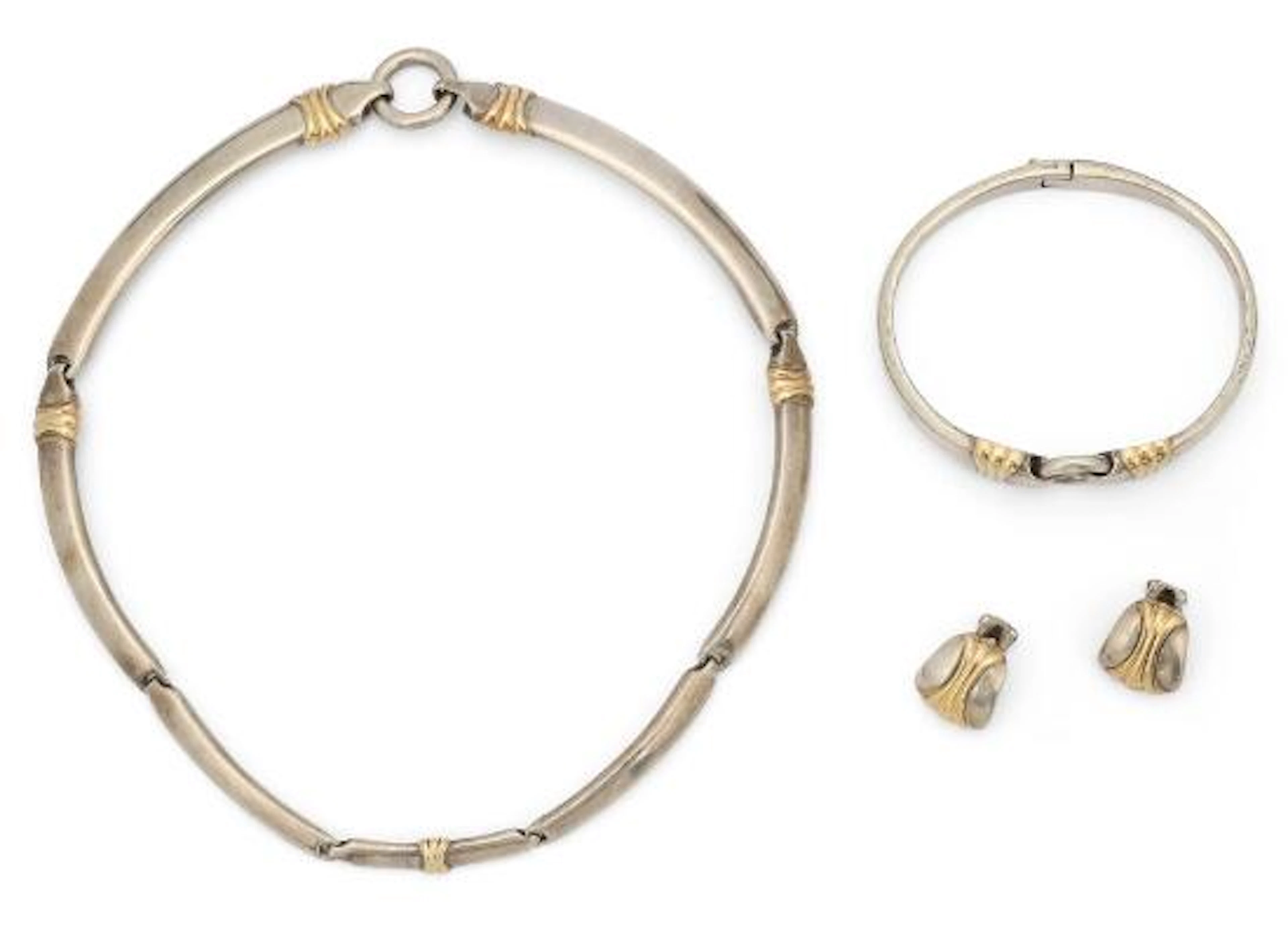 Christoffle: A jewellery set comprising of a pair ear clips, bracelet