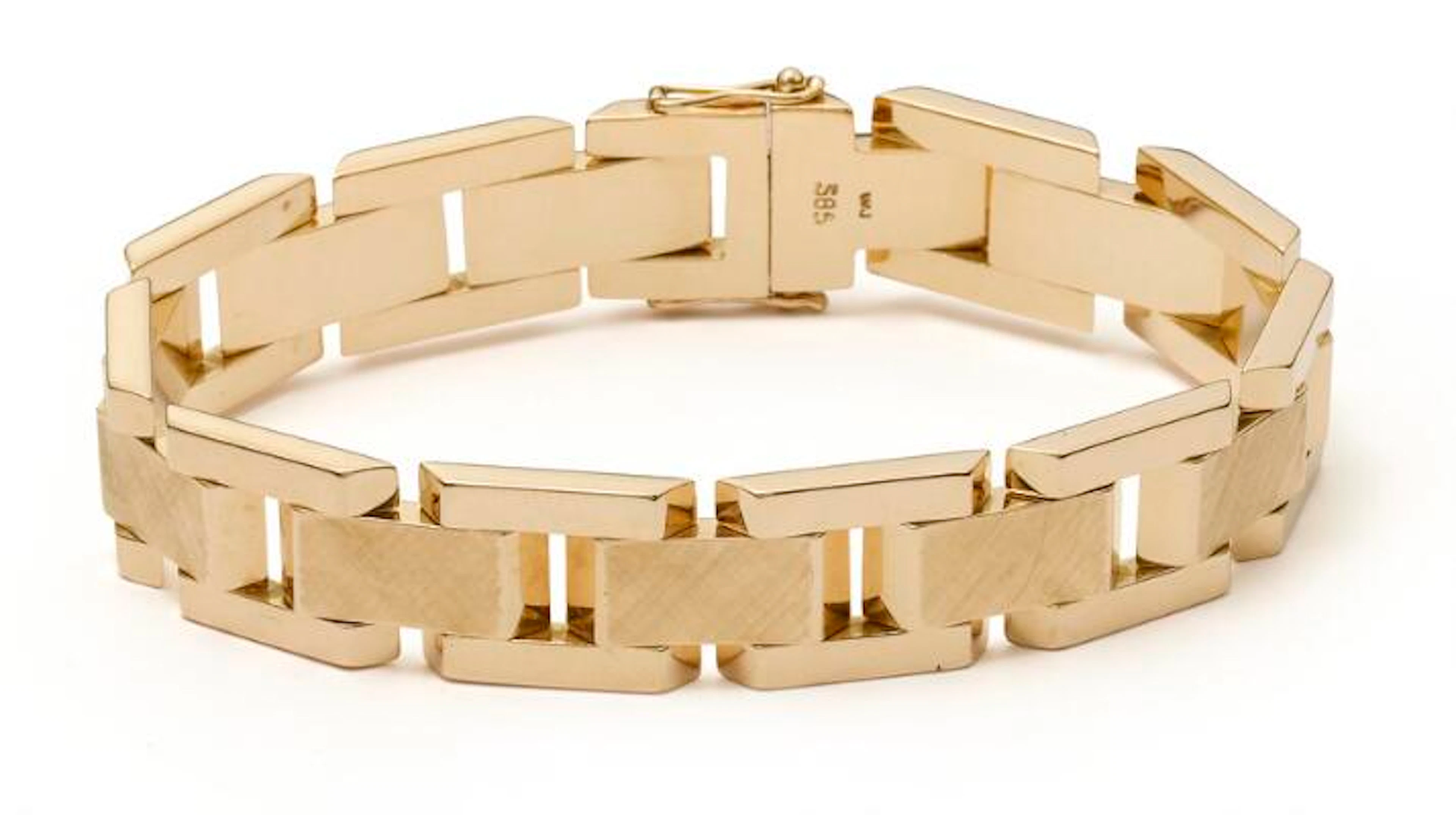A bracelet of 14k gold. Weight app. 32.5 g. W. 12 mm. L. 18.2 cm.