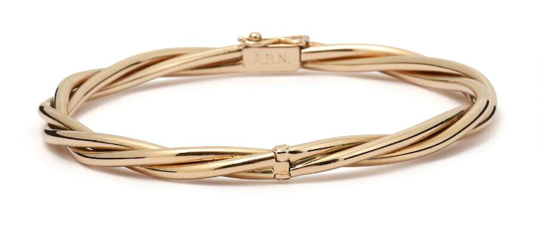 Chr. Rasmussen: A bangle of 14k gold. Weight app. 33.5 g. W. 4.5 mm.