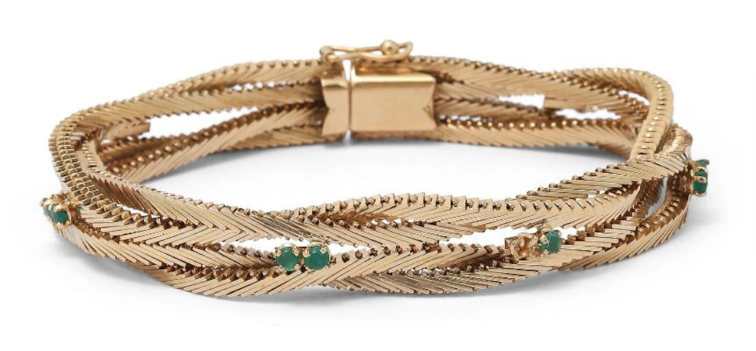 An emerald bracelet set with emeralds, mounted in 18k gold. Weight