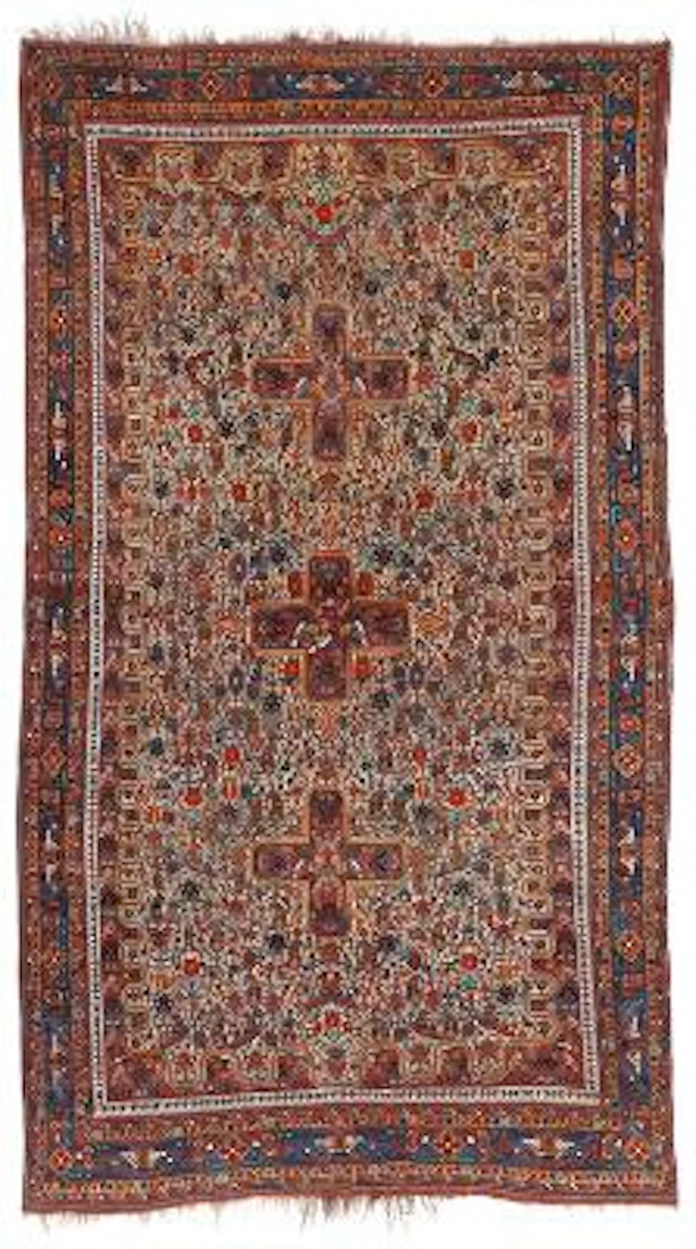 An antique Neiriz tribal rug, south Persia. Cross medallions on an