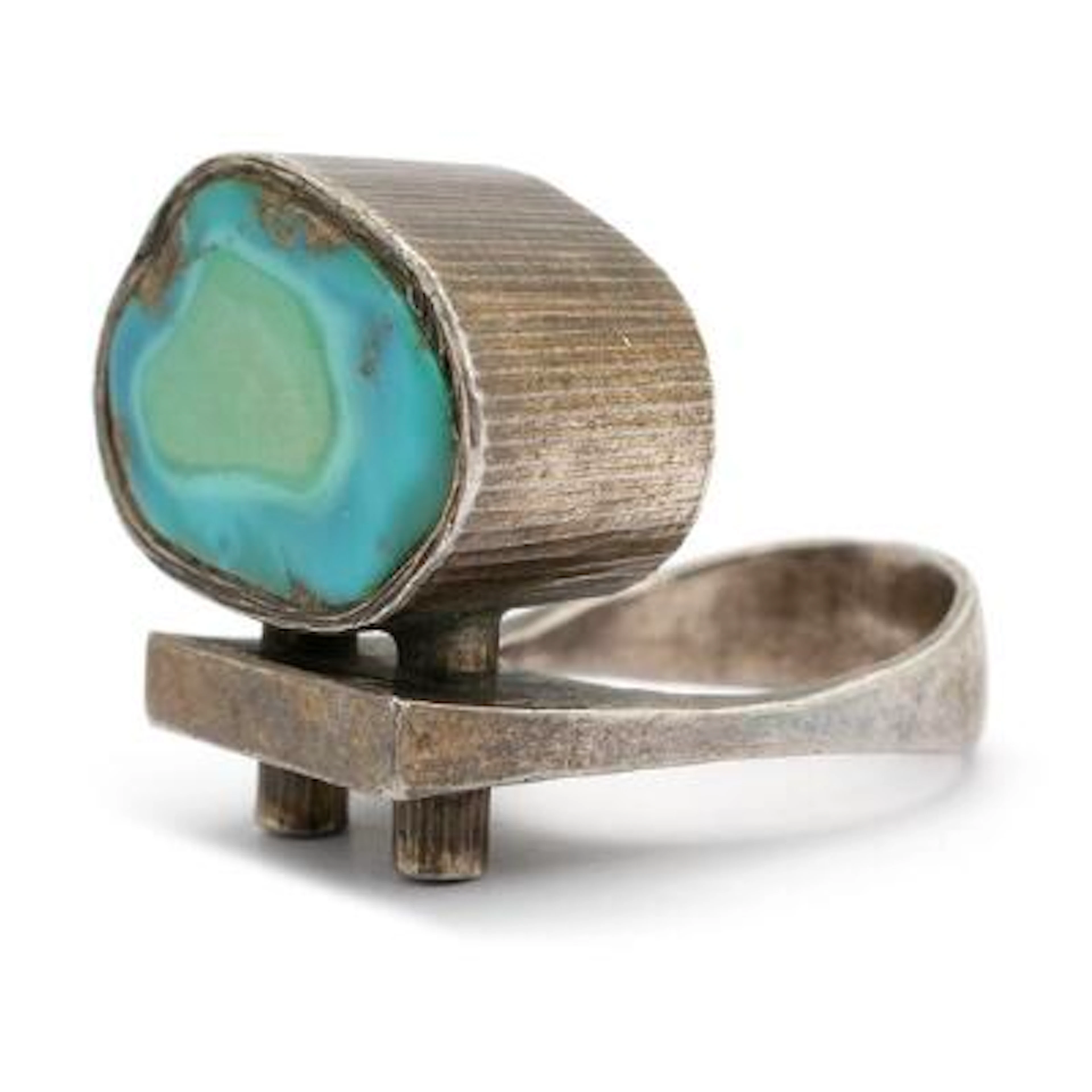 Ole W. Jacobsen: A ring set with a turquoise green chrysocolla, mounted