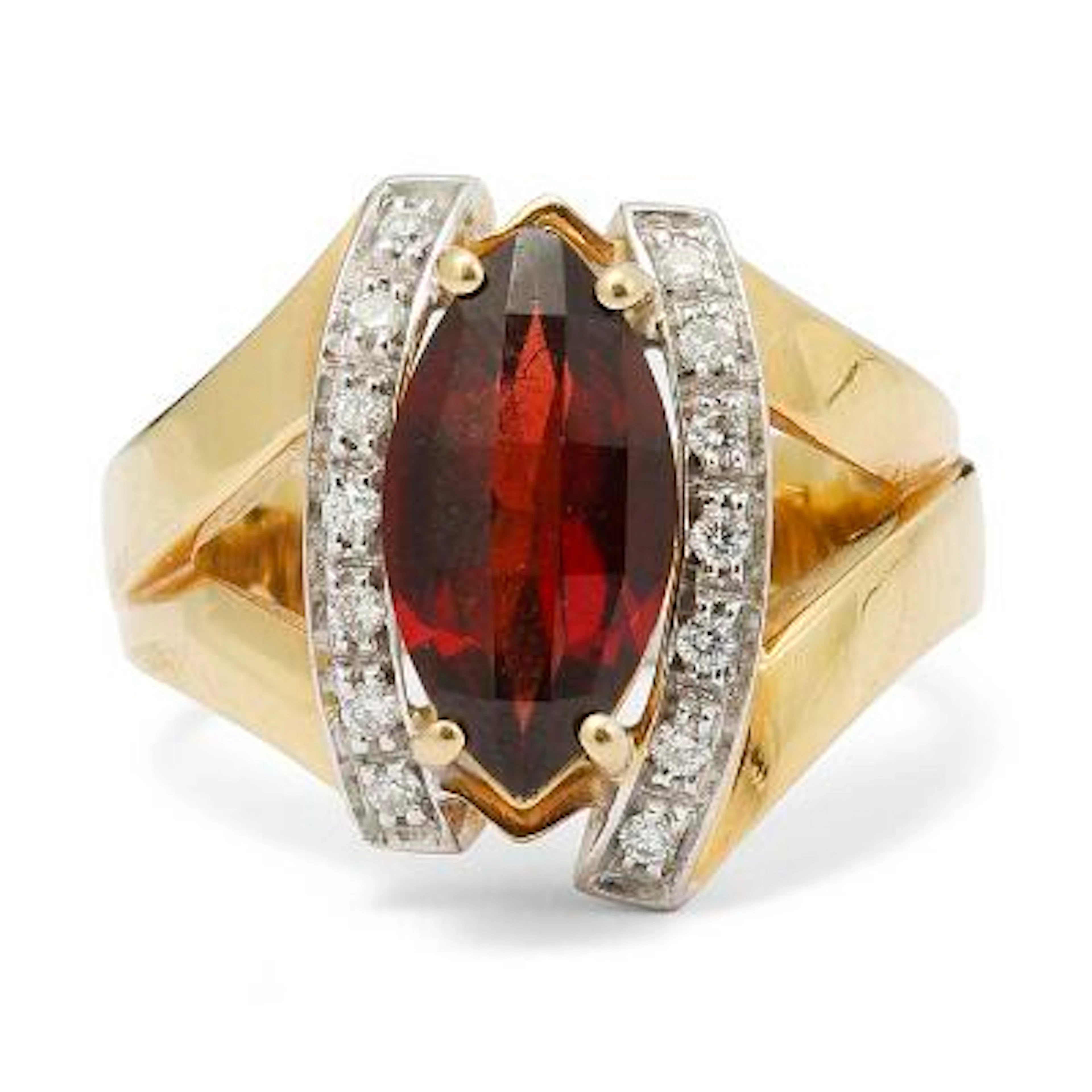 A garnet and diamond ring set with a garnet and numerous diamond