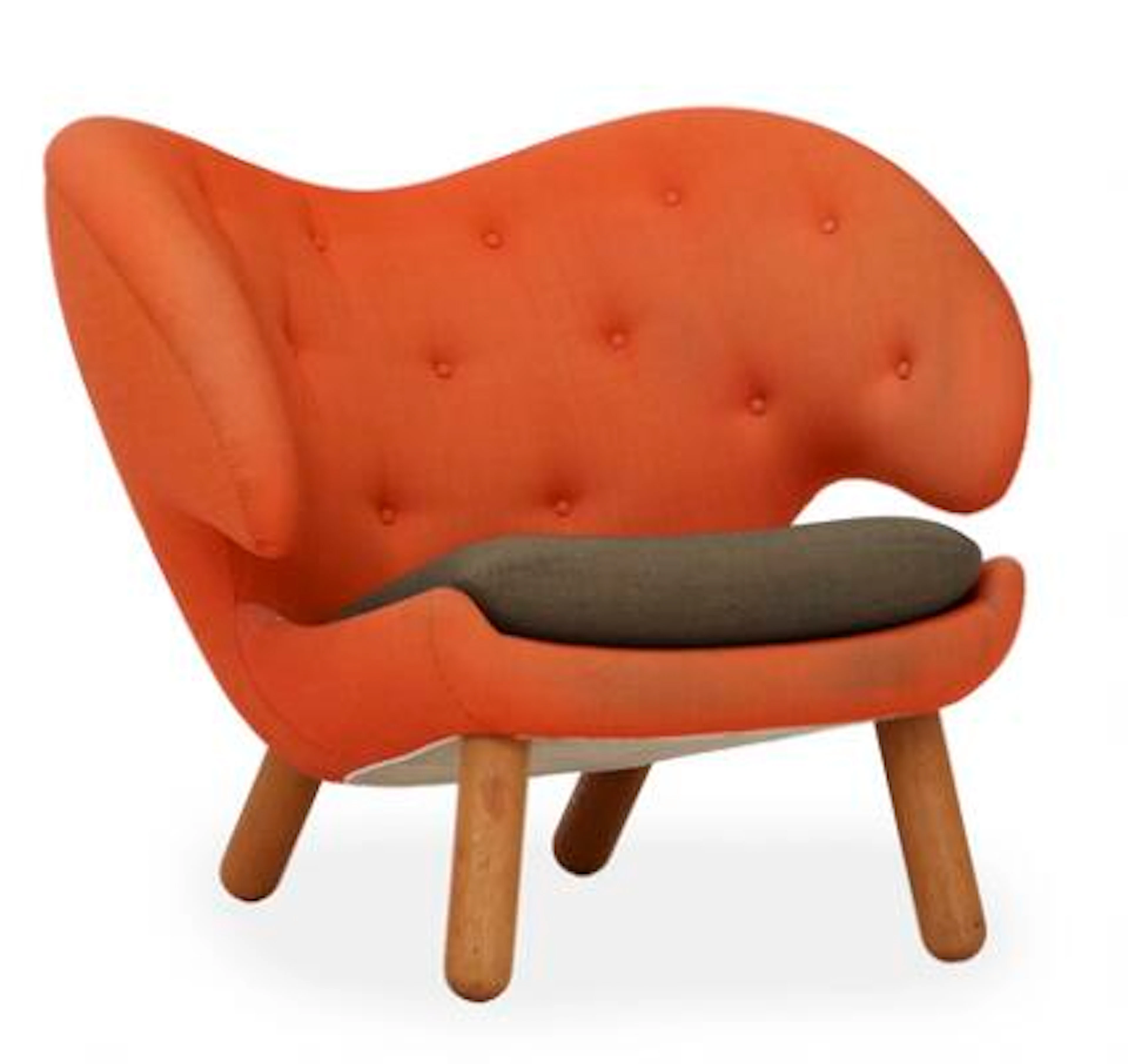 Finn Juhl: “The Pelican”. Easy chair with wallnut legs. Sides and