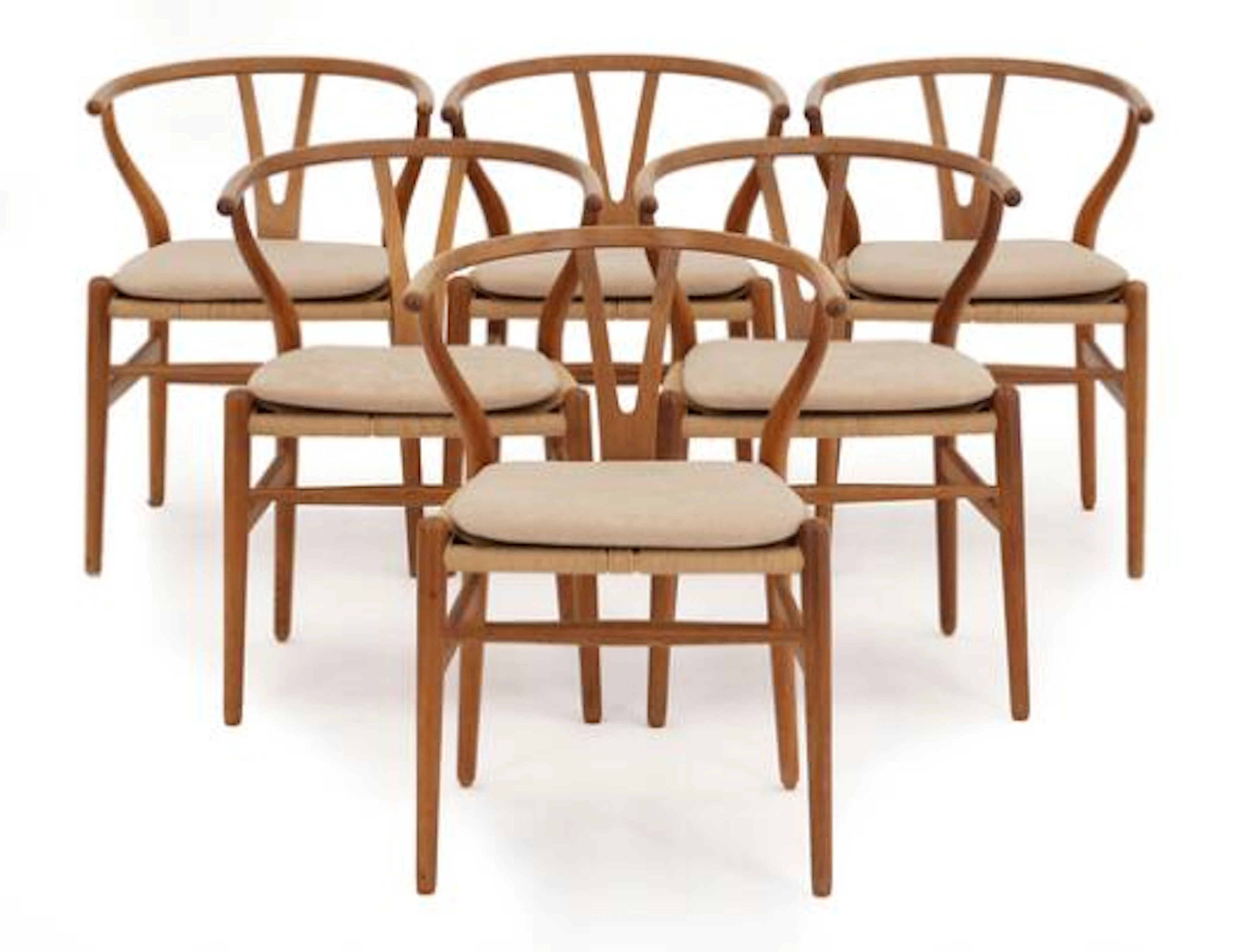 Hans J. Wegner: "Y-Chair". Set of six armchairs in patinated oak.