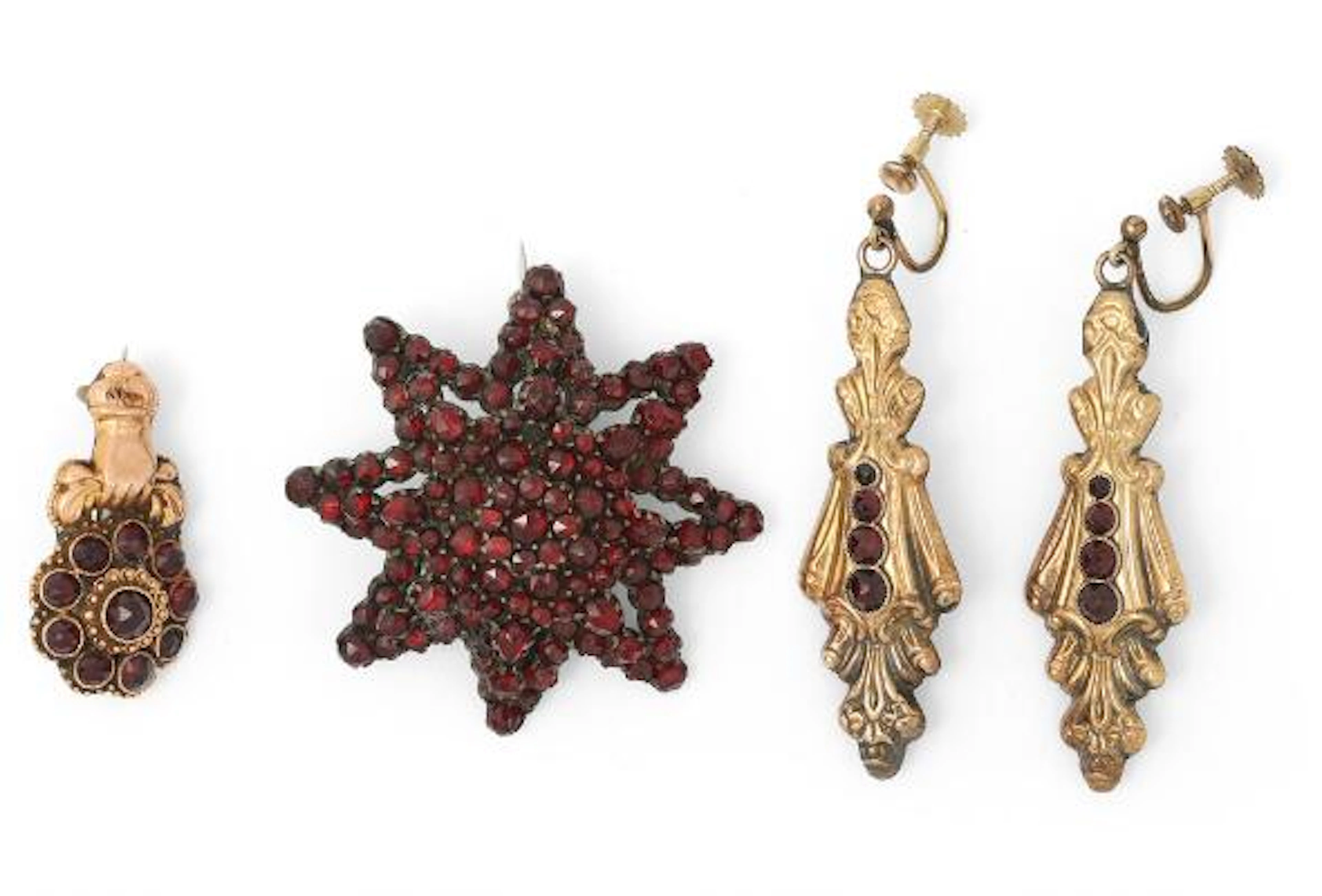 A jewellery collection comprising of two brooches and a pair of ear