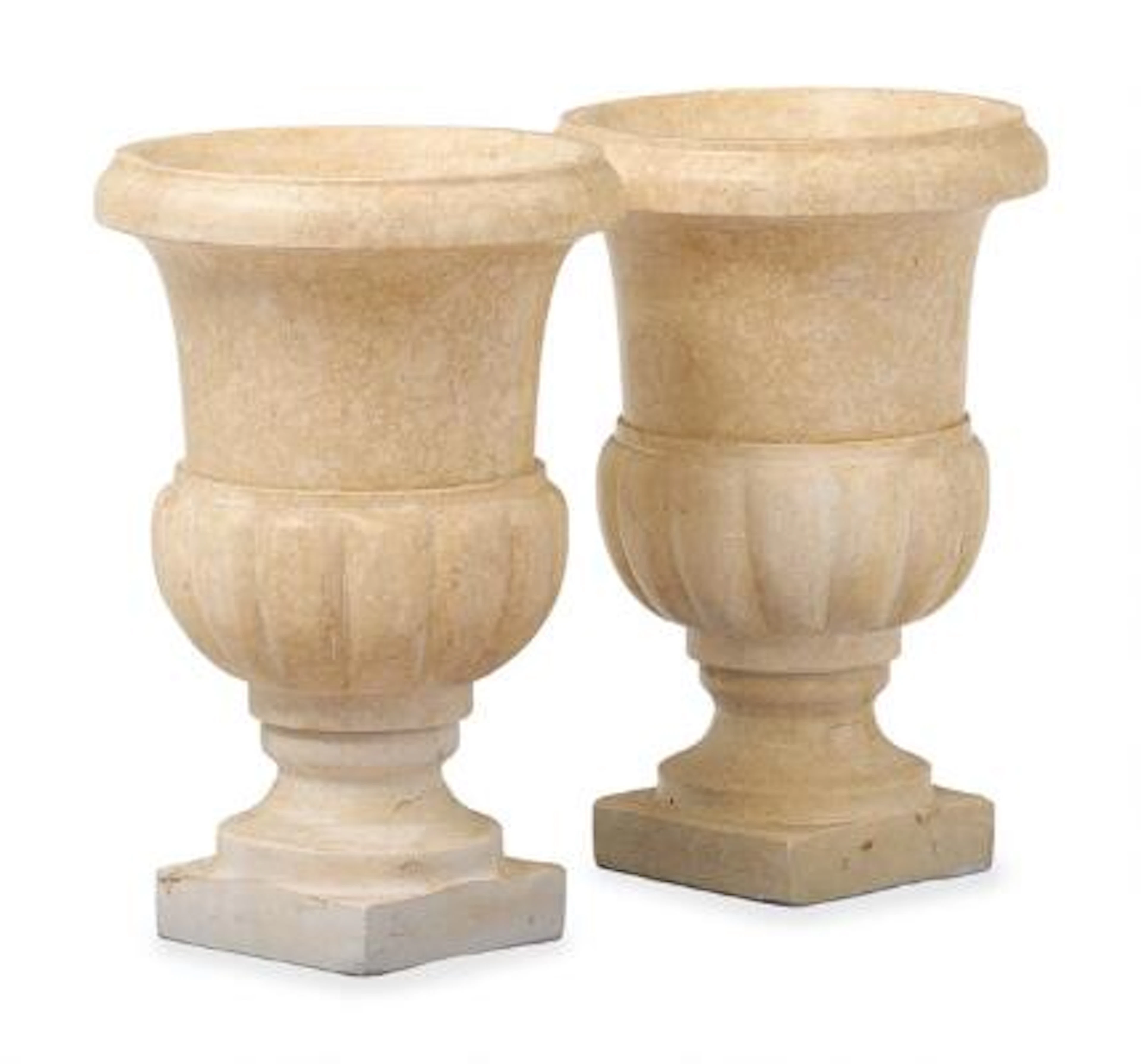 A pair of garden urns in composite, baluster-shaped on four-sided