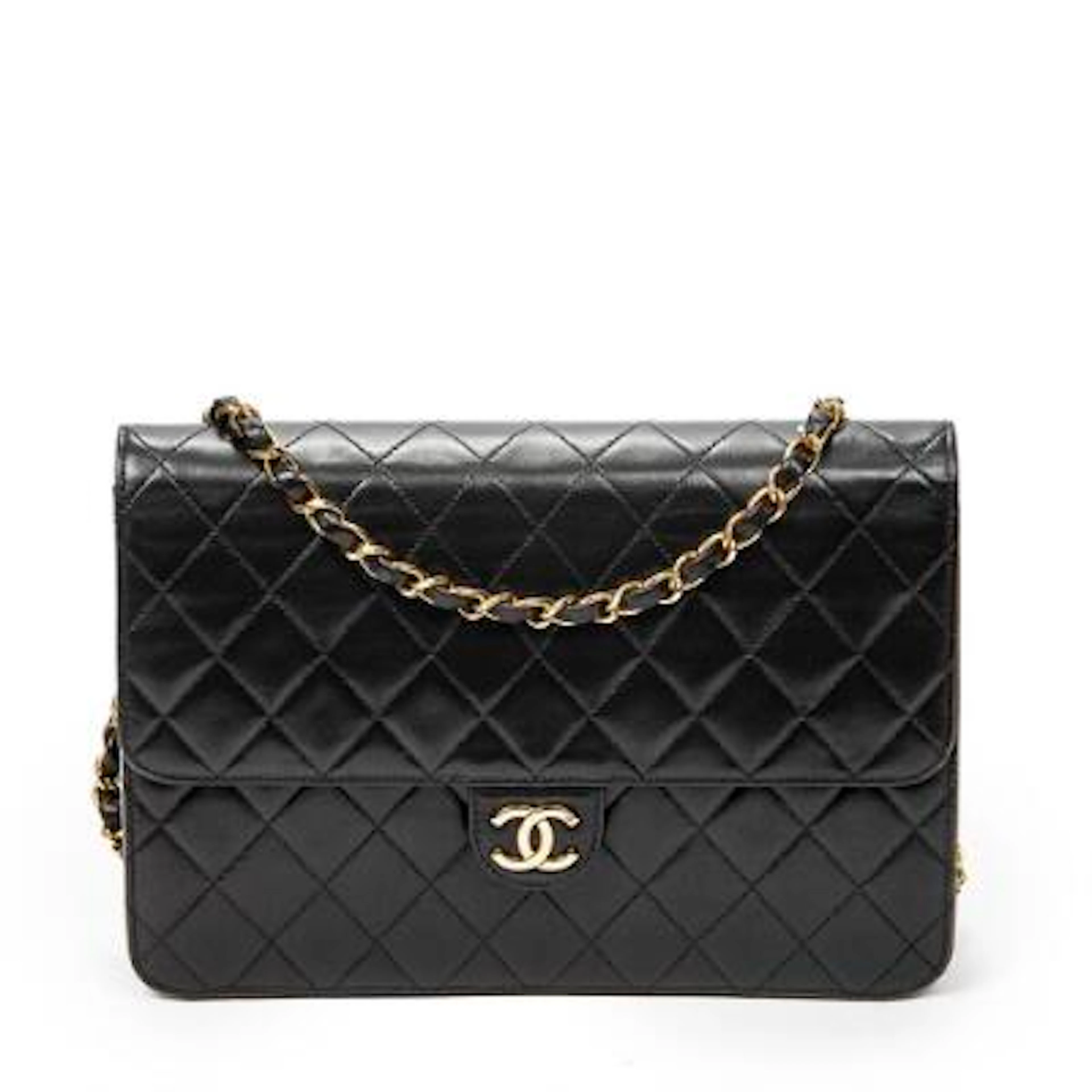 Chanel: A "Vintage Push Lock Straight Flap" bag of black quilted leather