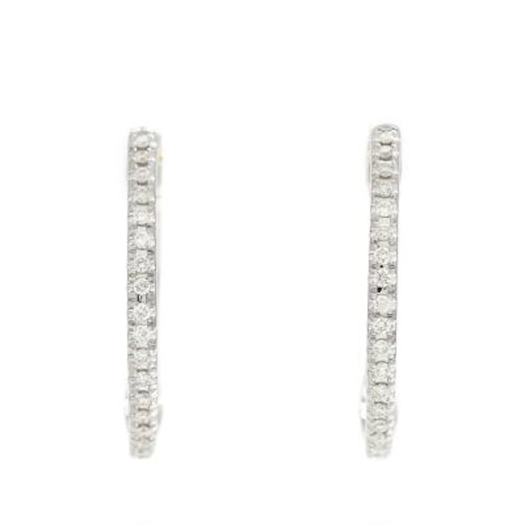 A pair of diamond ear hoops, each set with numerous brilliant-cut