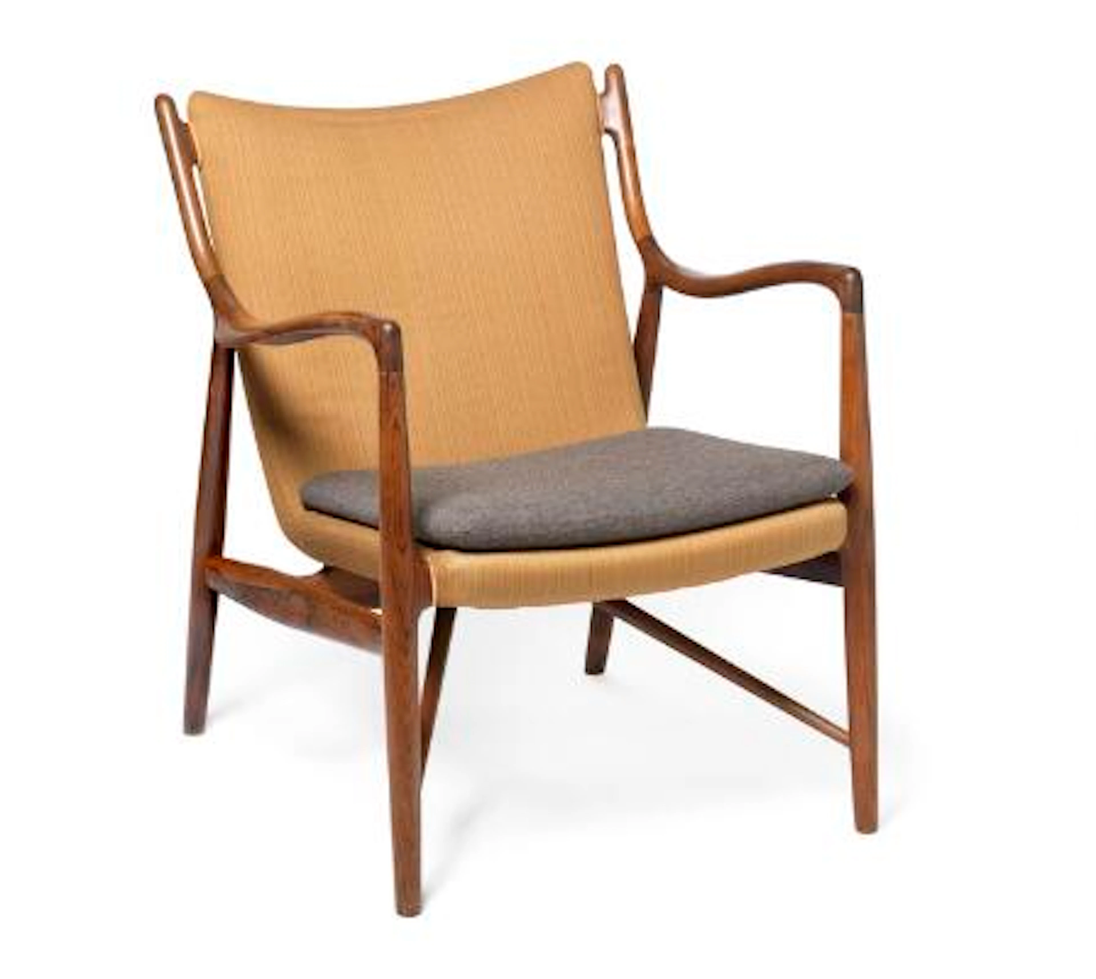 Finn Juhl: “FJ 45”. A Brazilian rosewood easy chair. Upholstered with