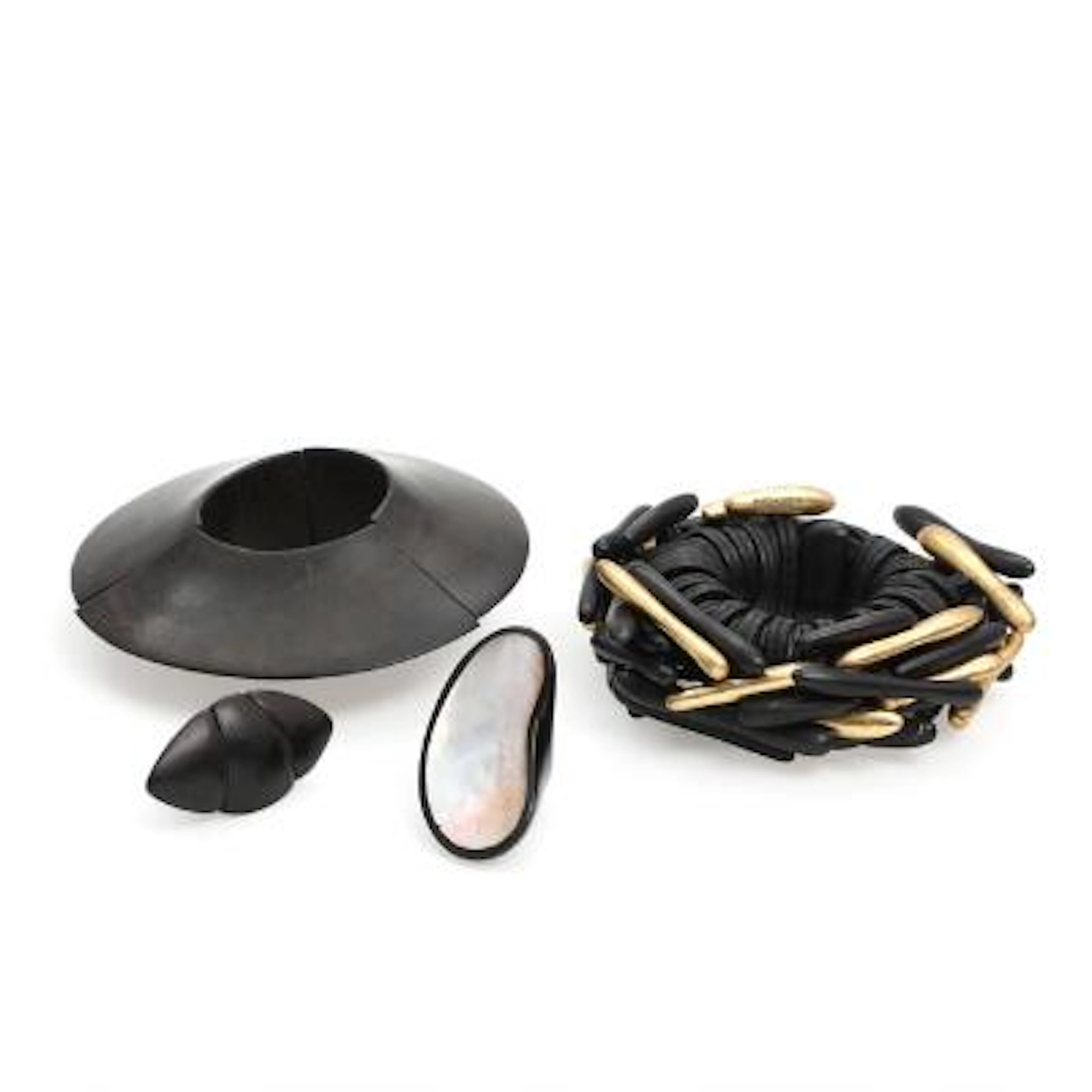 Gerda Lynggaard: A collection of jewellery in ebony, leather and mother-of-pearl