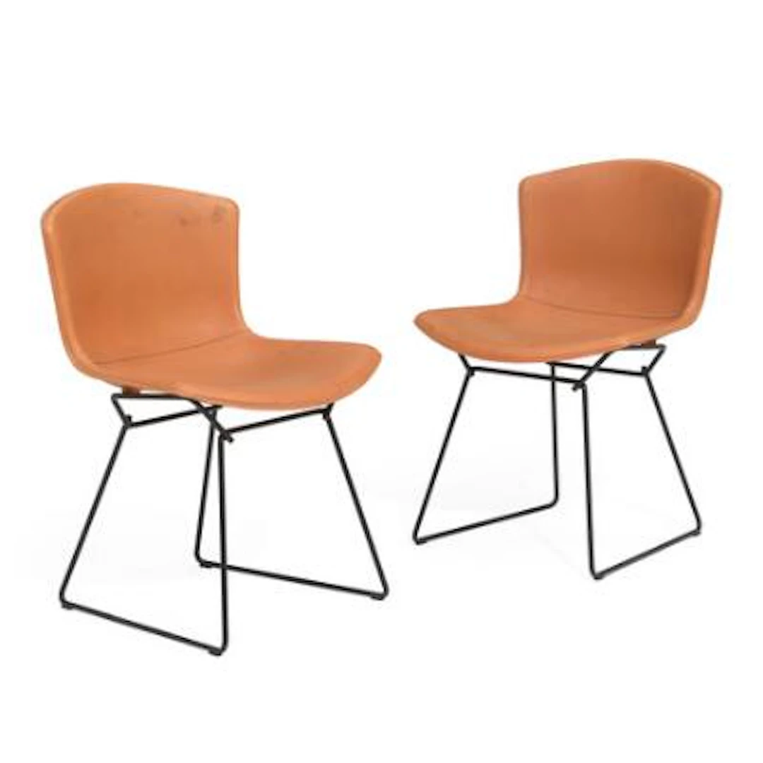 Harry Bertoia: A pair of side chairs with black lacquered steel base