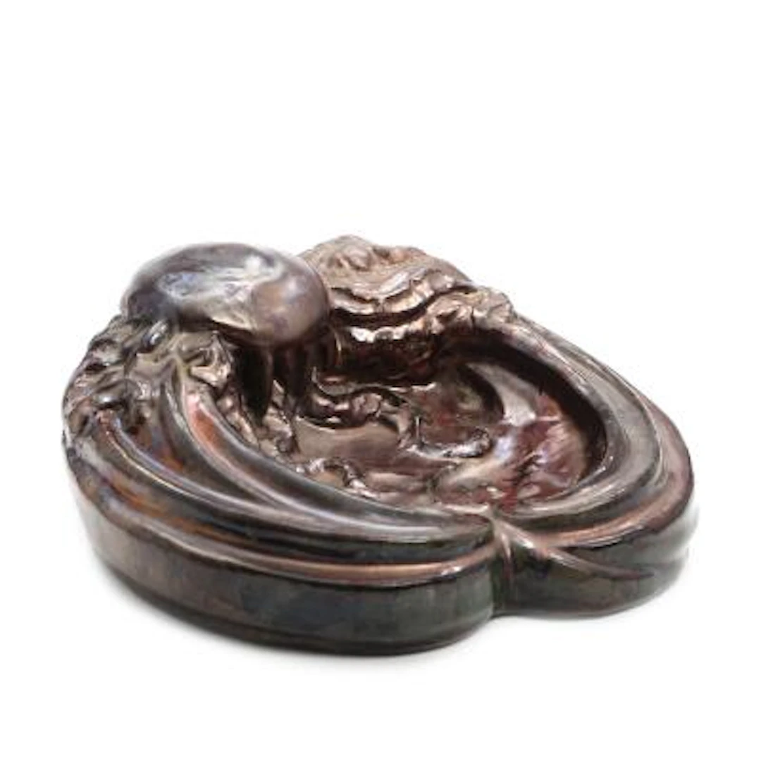 Jens Petersen: Dish of earthenware modelled with octopus. Decorated