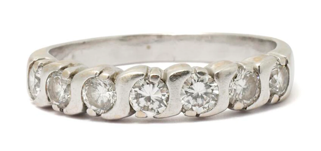 Diamond alliance ring set with numerous brilliant-cut diamonds, mounted