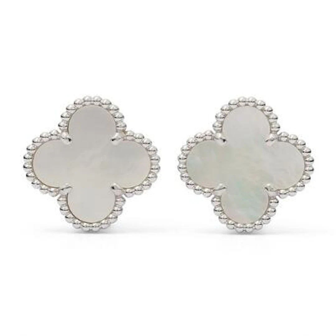 Van Cleef & Arpels: A pair of "Alhambra" ear studs each set with mother