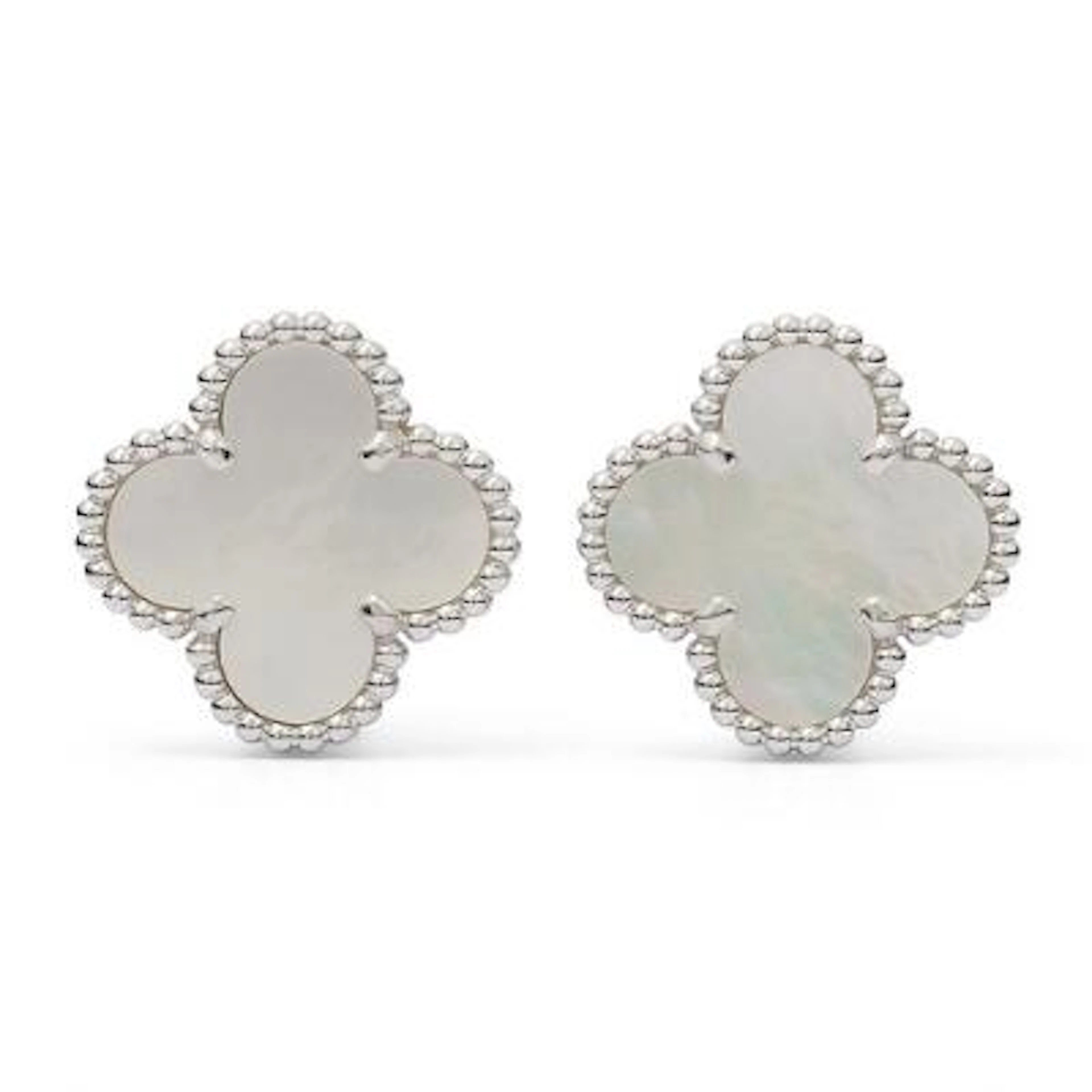 Van Cleef & Arpels: A pair of "Alhambra" ear studs each set with mother