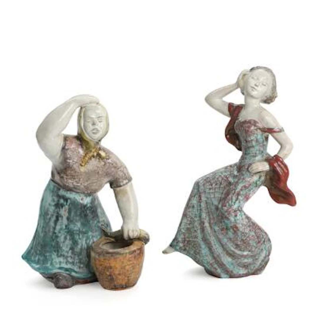 Michael Andersen: Two earthenware figures modelled as a fisherwoman
