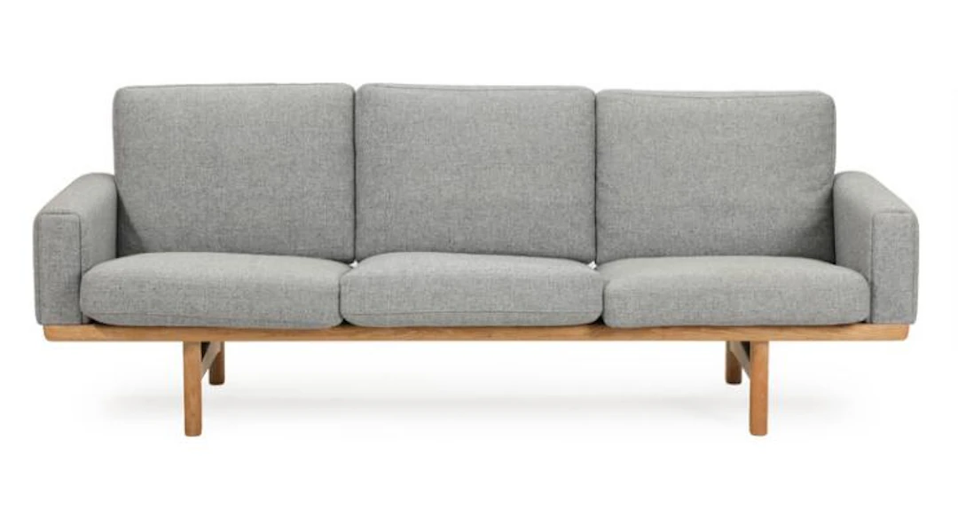 Hans J. Wegner: "GE 236". Three seater solid oak sofa, with light