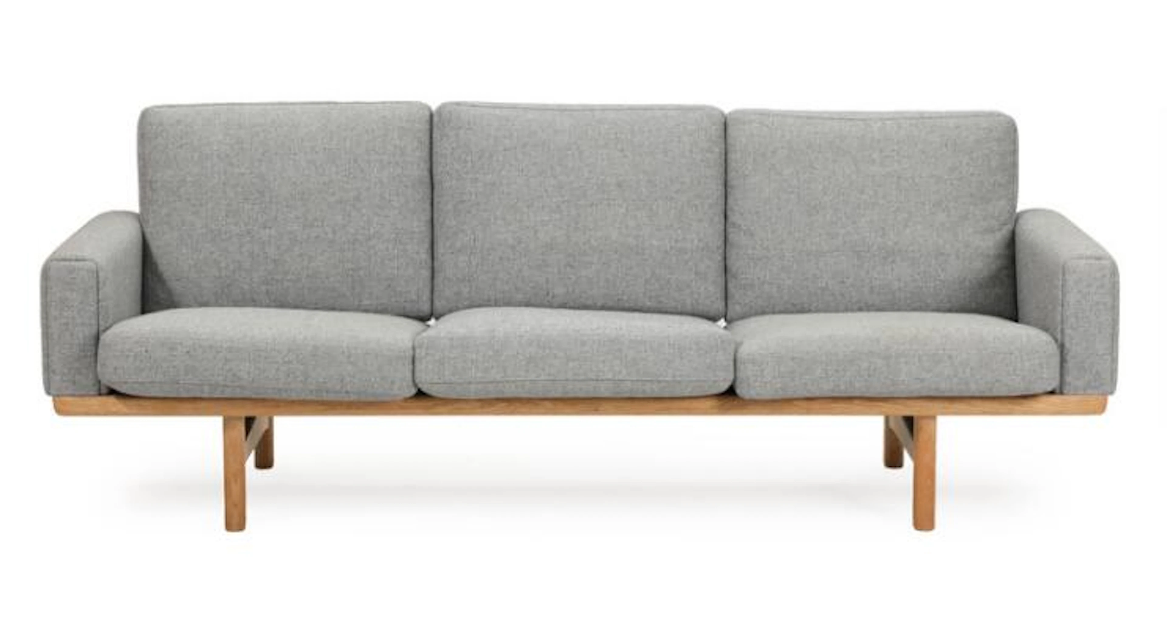 Hans J. Wegner: "GE 236". Three seater solid oak sofa, with light