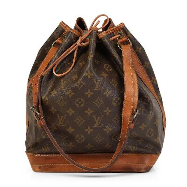 Louis Vuitton: A "Noé" bag of brown monogram canvas with brown leather