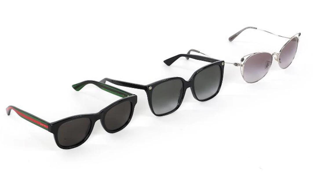 Coach, Gucci: A collection comprising of three pairs of sunglasses.