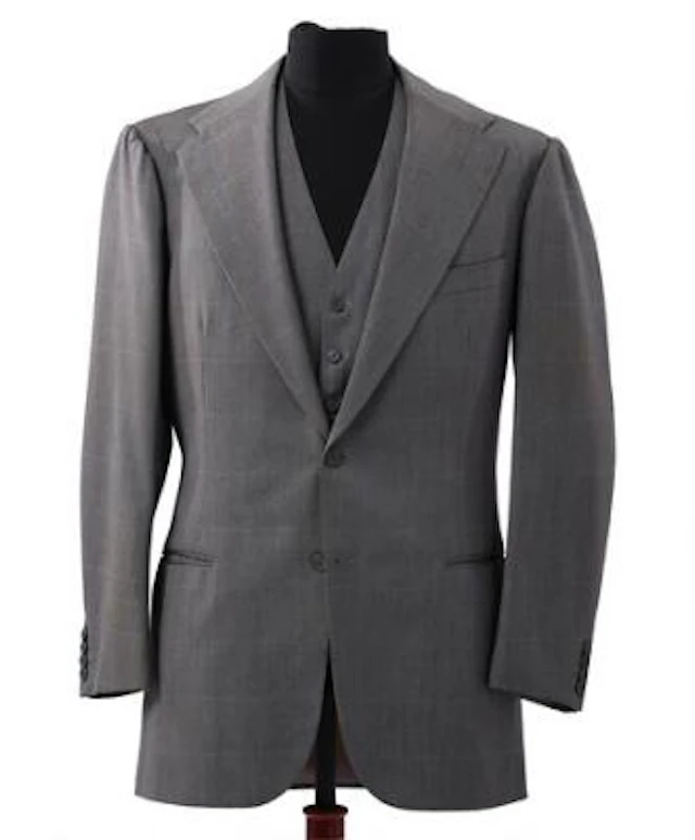 Alfred Alm: A grey jacket with matching waistcoat with a light blue