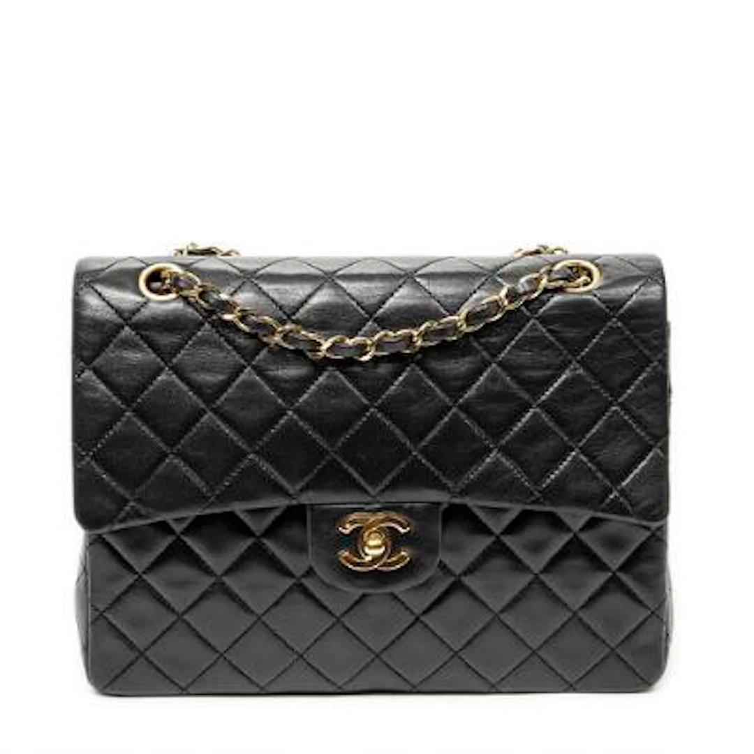 Chanel: A "Medium Square Double Flap" bag of black quilted leather