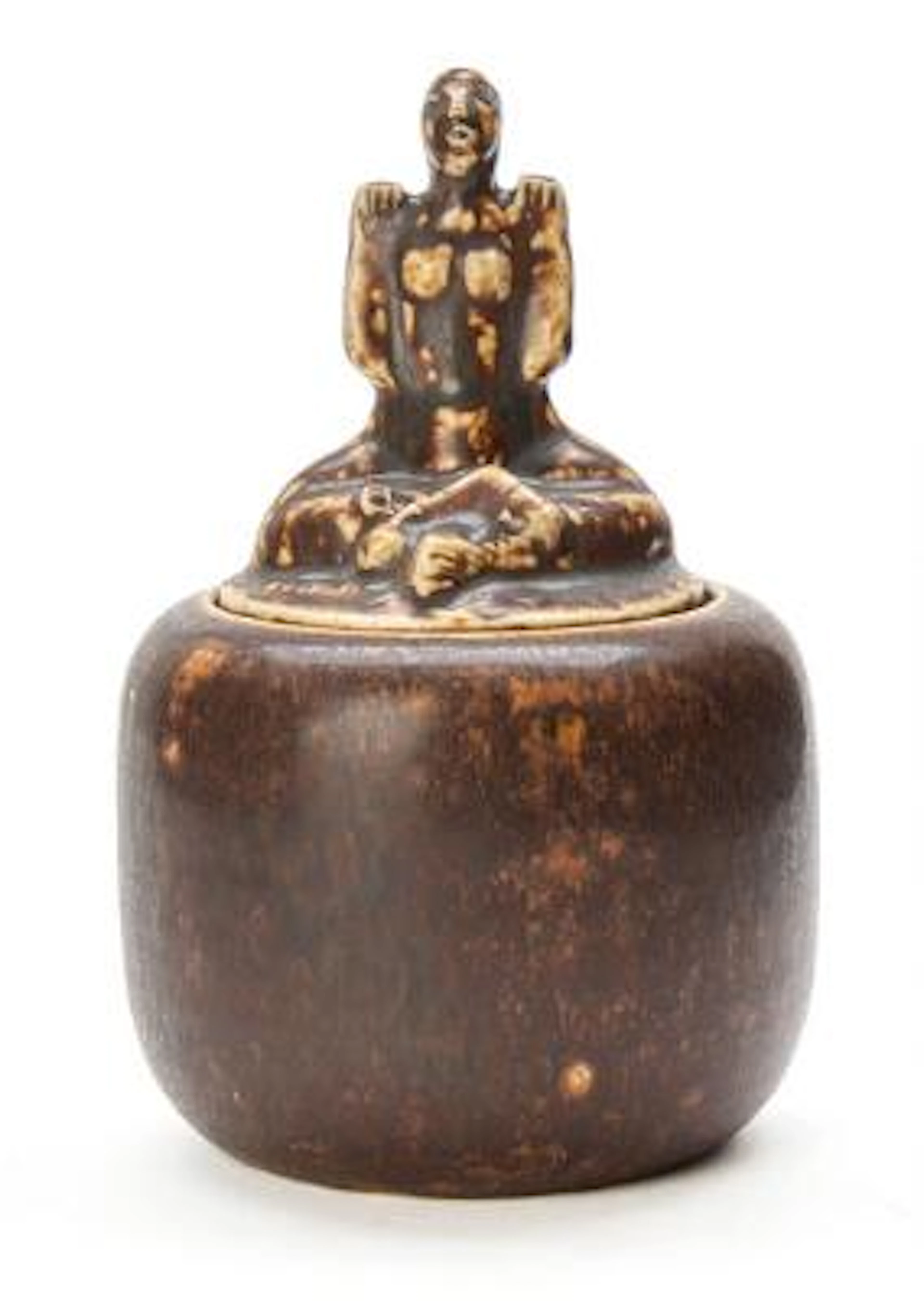 Jais Nielsen: A stoneware lidded jar. Decorated with dark brown glaze.